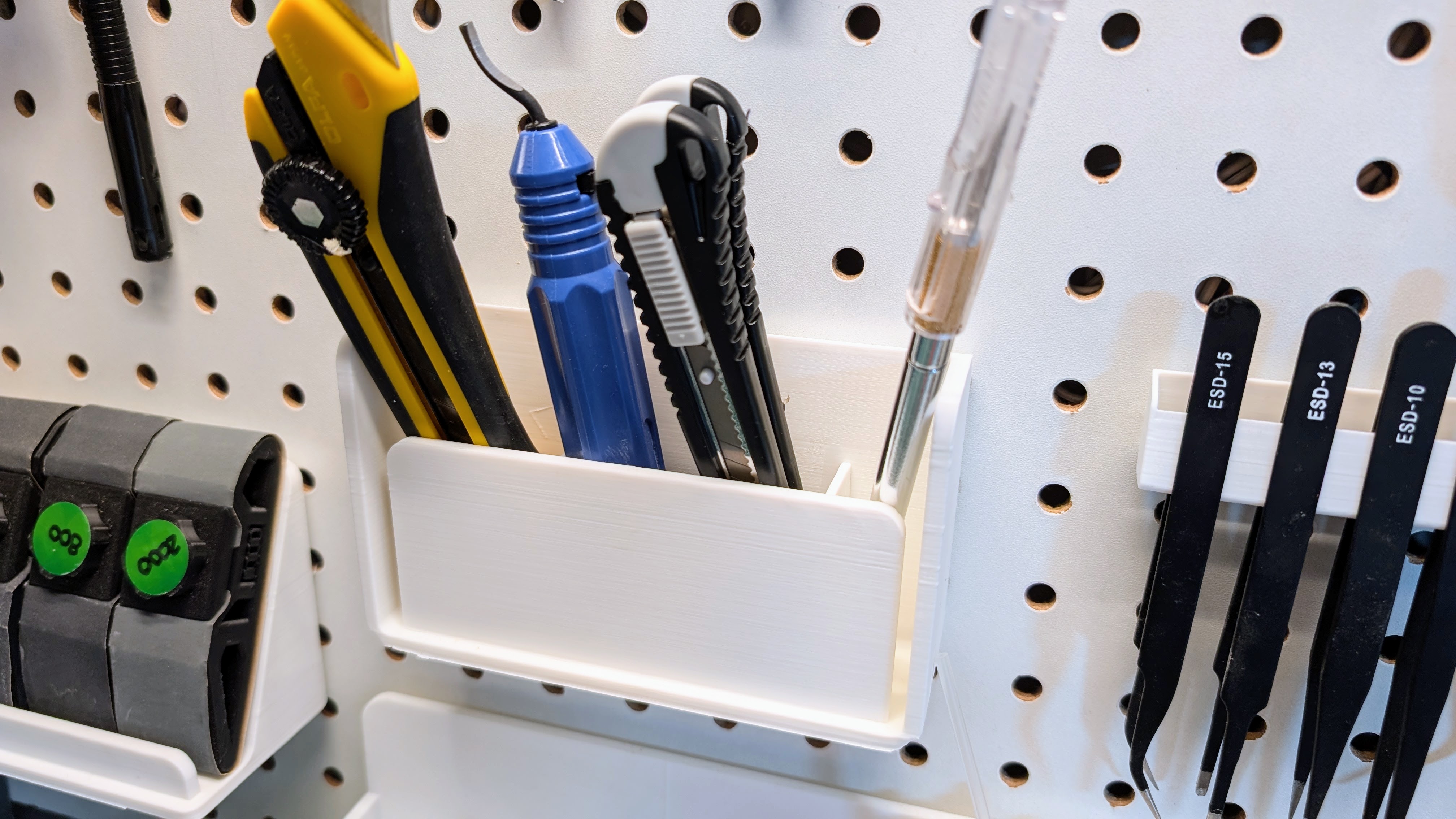 Pegboard - Exacto knife container