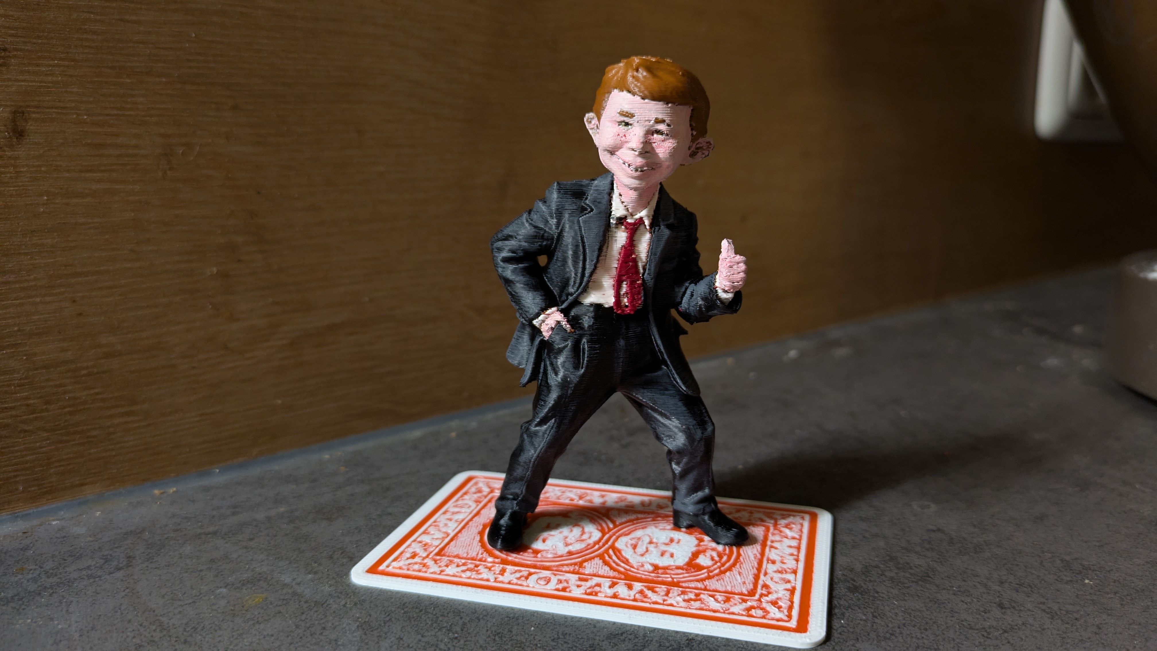 Alfred E Neuman Figurine standing on MAD card
