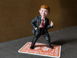Alfred E Neuman Figurine standing on MAD card by stefanmader1984