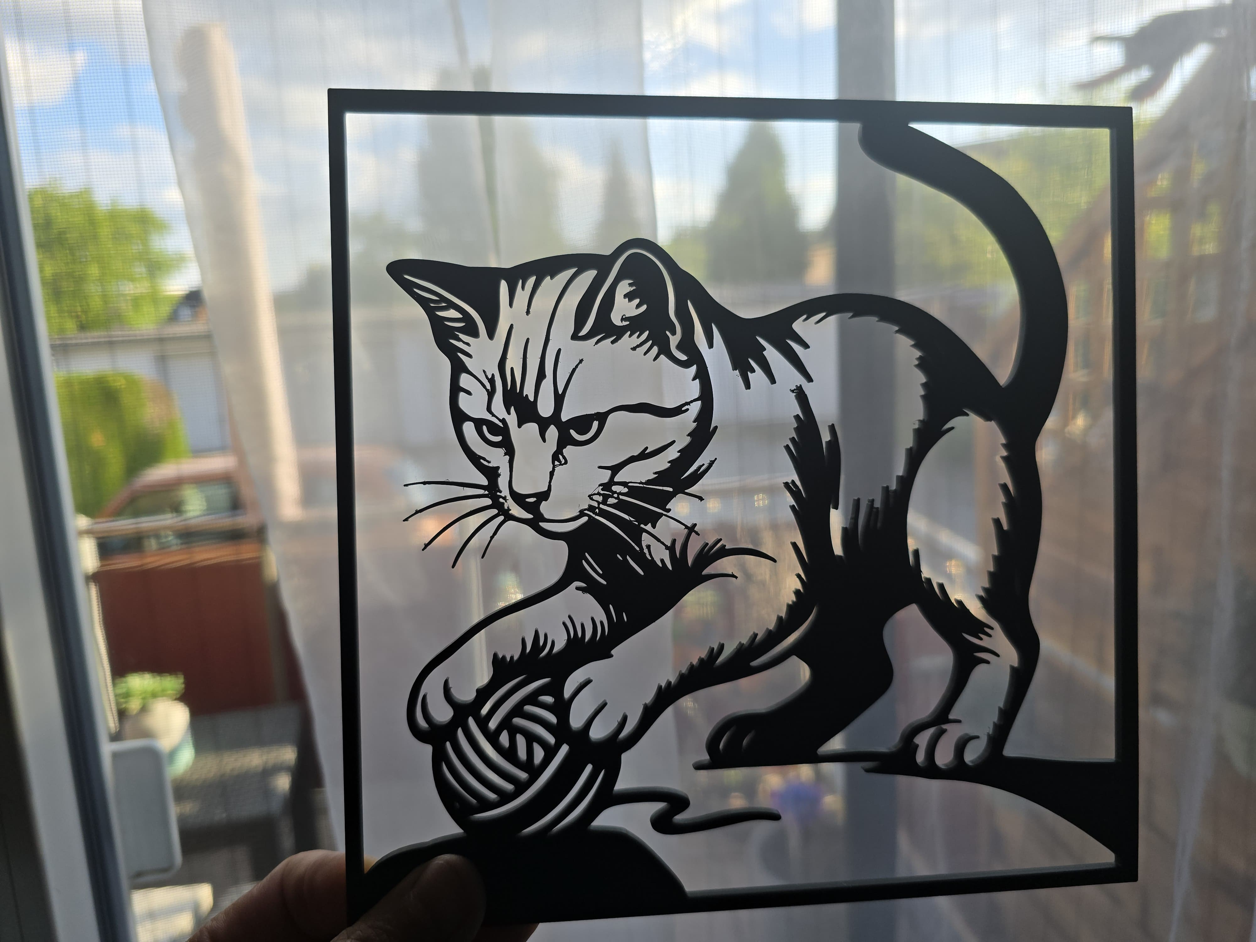 Katze mit Wollknäuel