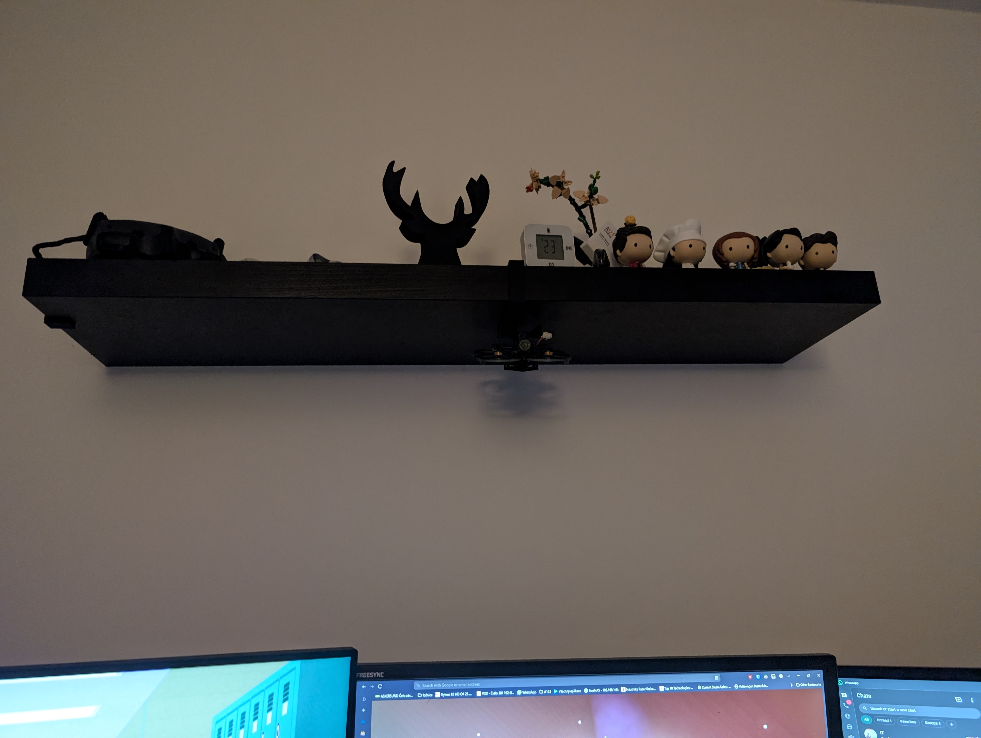 Universal drone shelf holder