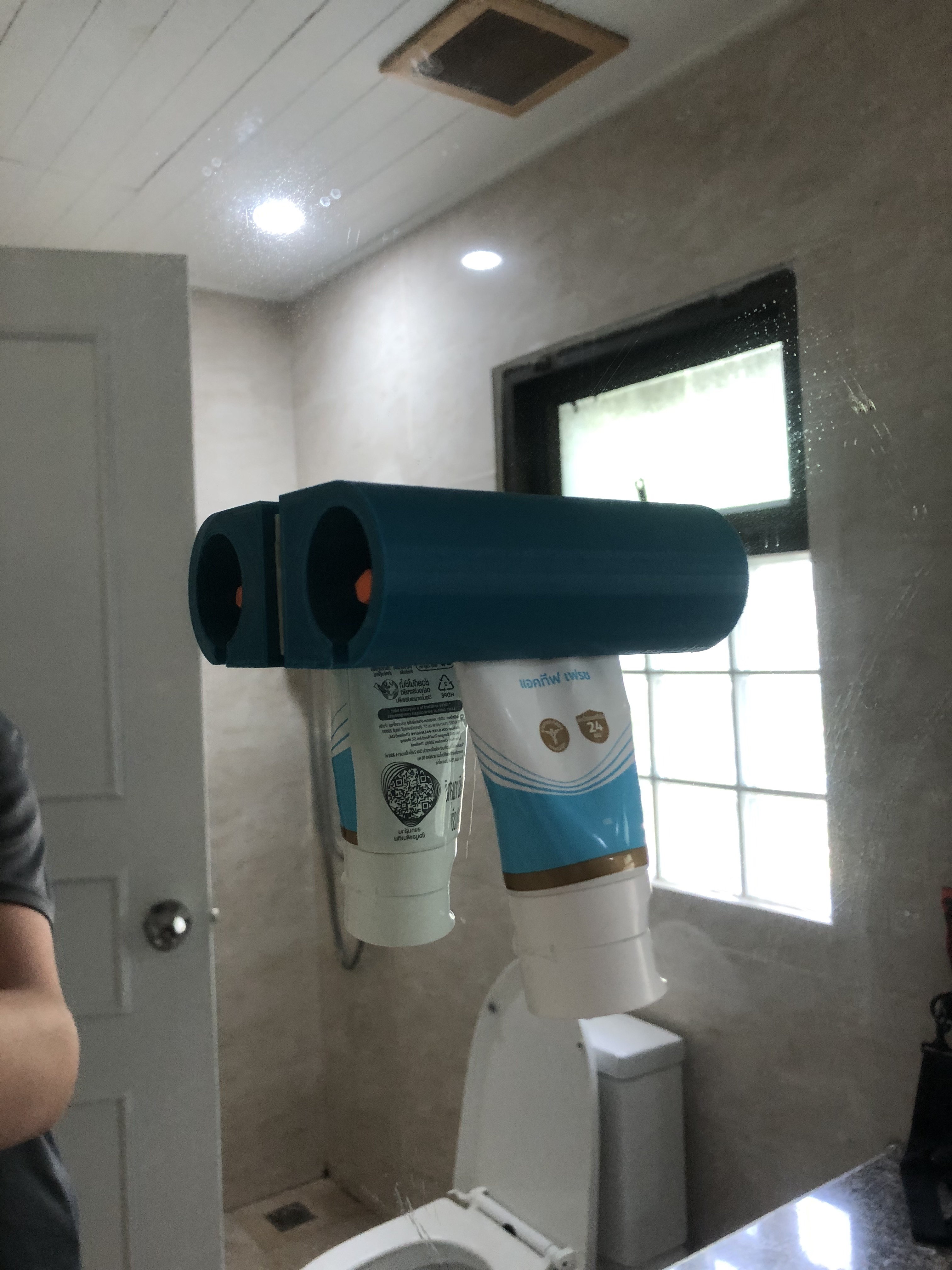 toothpaste squeezer holder for mirror