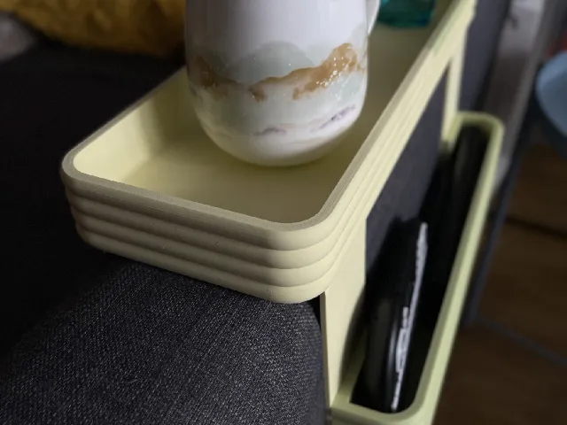 Simple armrest table with remote holder