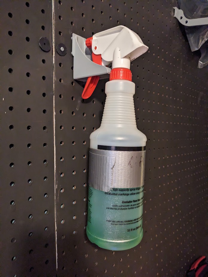 Spray Bottle Holder Peg Board by WonderWeasel Download free STL model