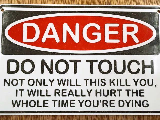 Funny Sign - "DANGER do not touch, Not only will this kill you, it will really hurt the whole time you're dying"