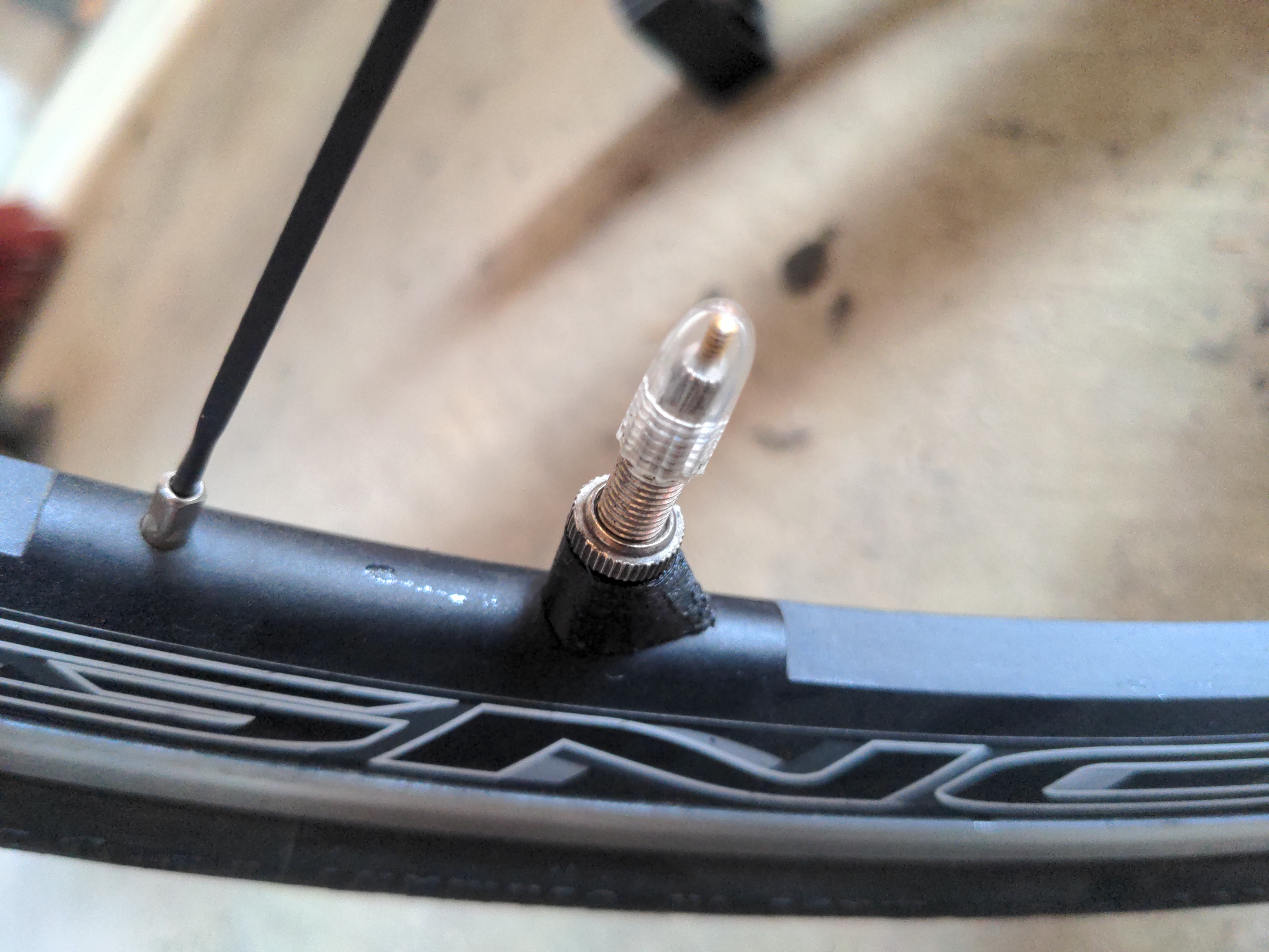 aerodynamic valve shim/washer