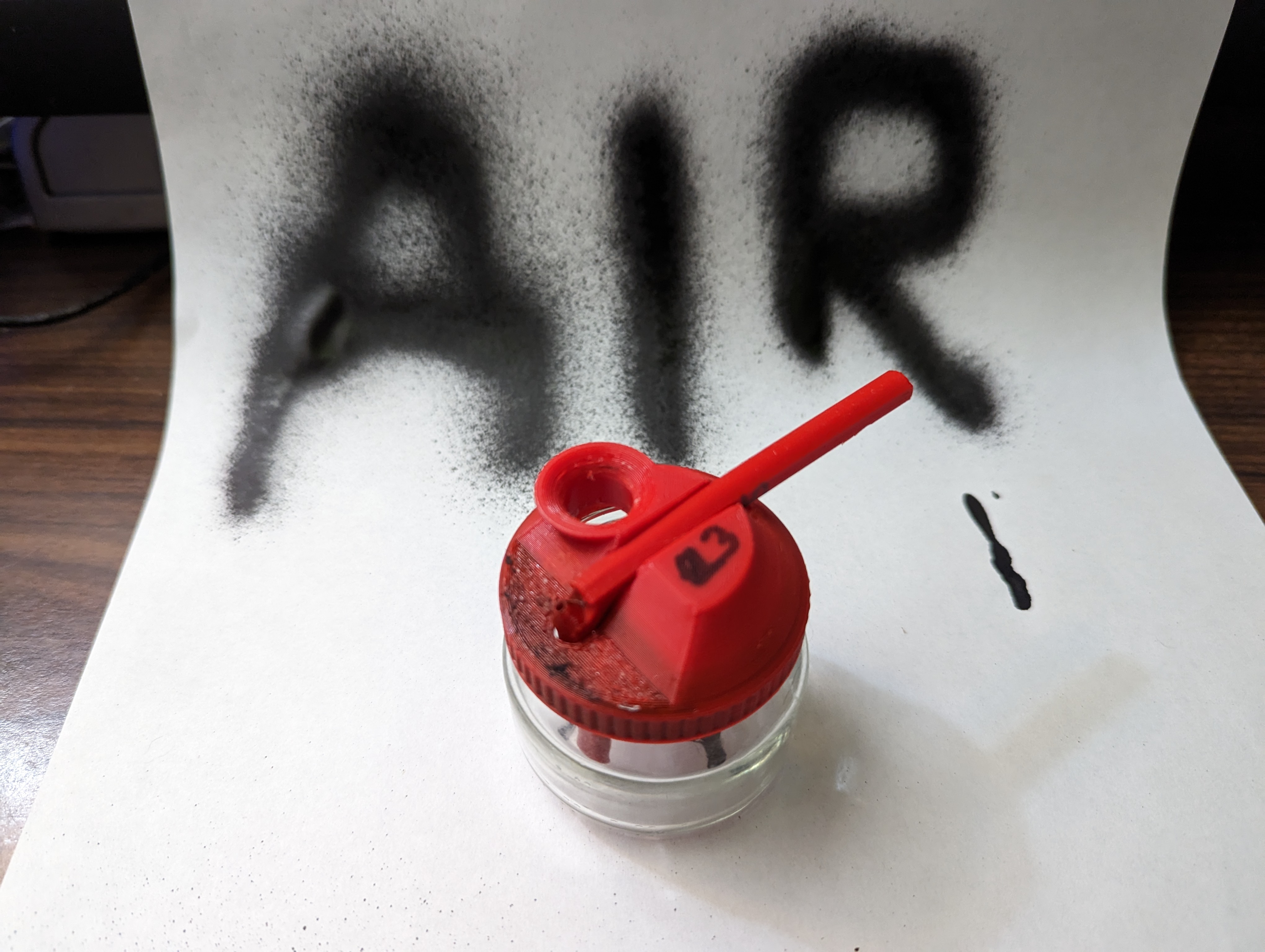 Mouth-blown airbrush lid for a Gerber baby food jar