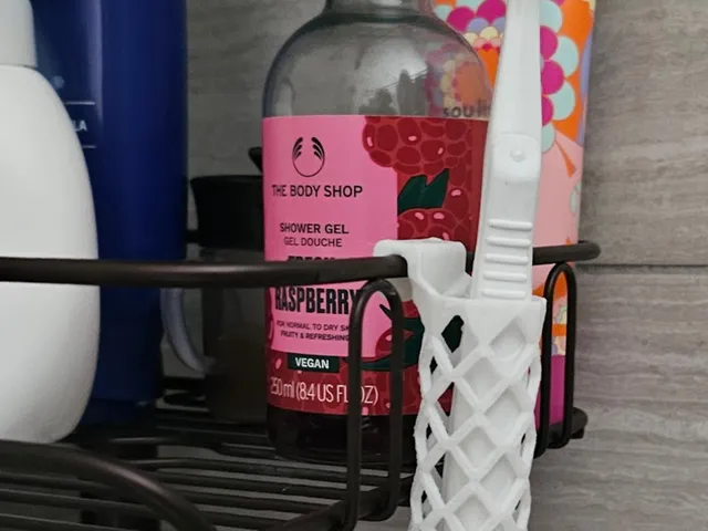 Lattice toothbrush holder for shower caddy