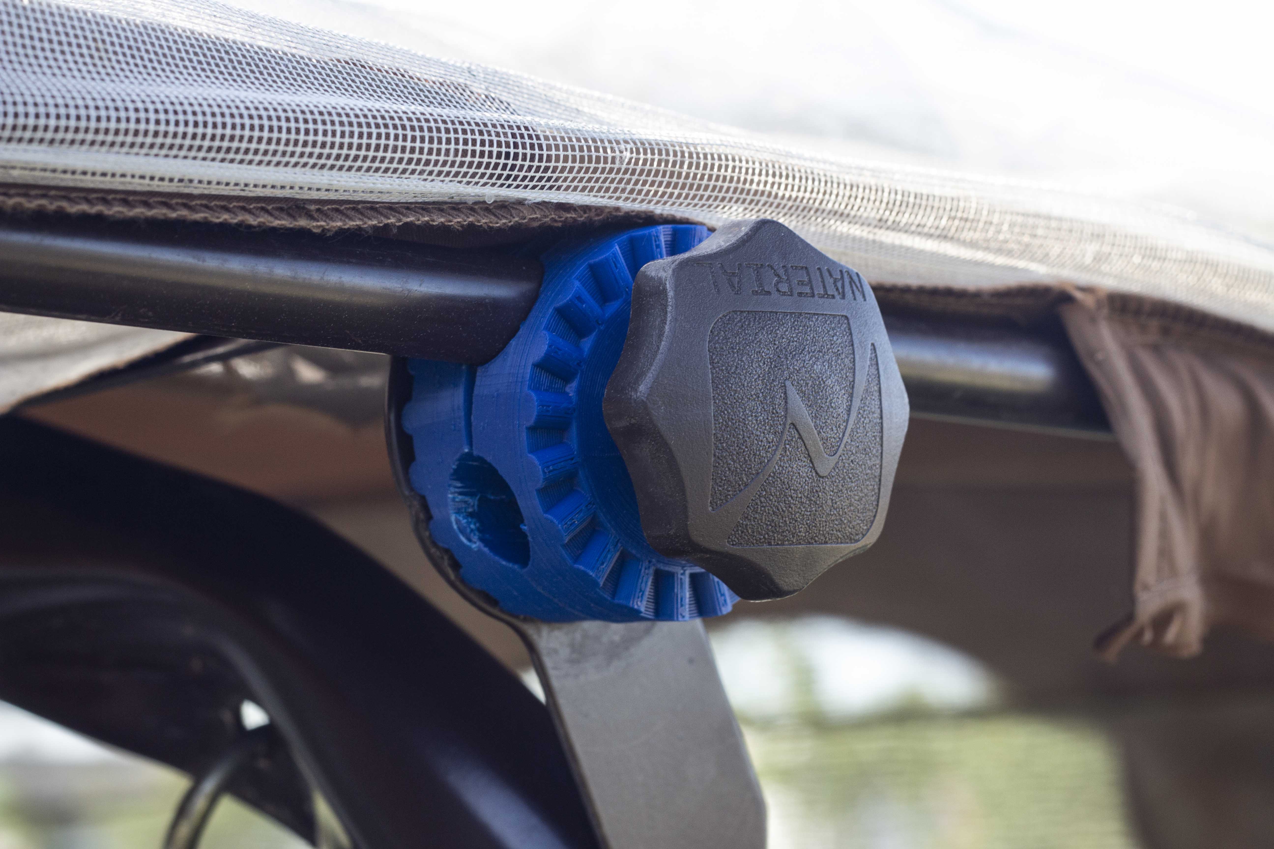 Reinforced fasteners of the awning of the garden swing