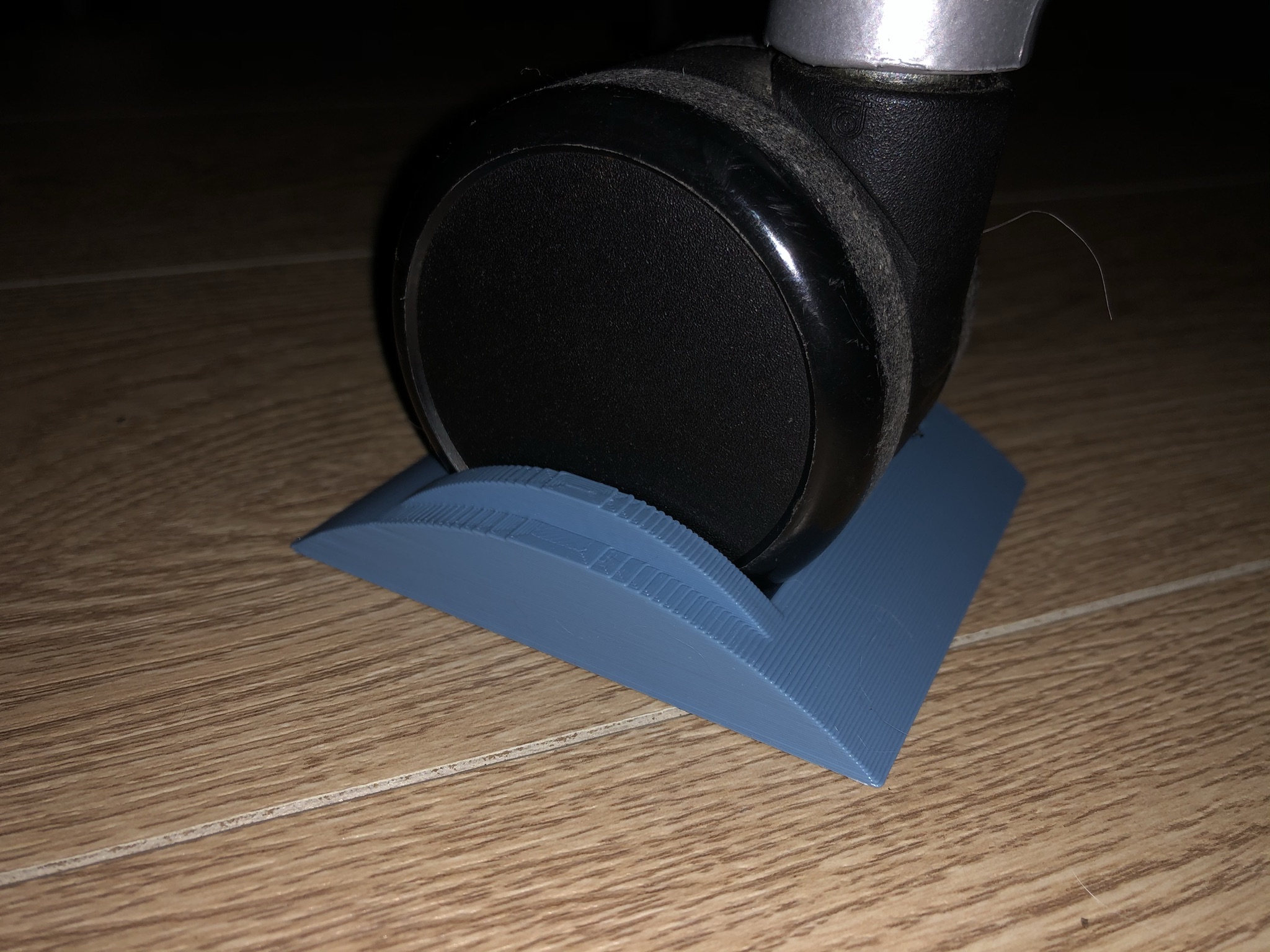 Chair chocks - Parking blocks for chairs with casters