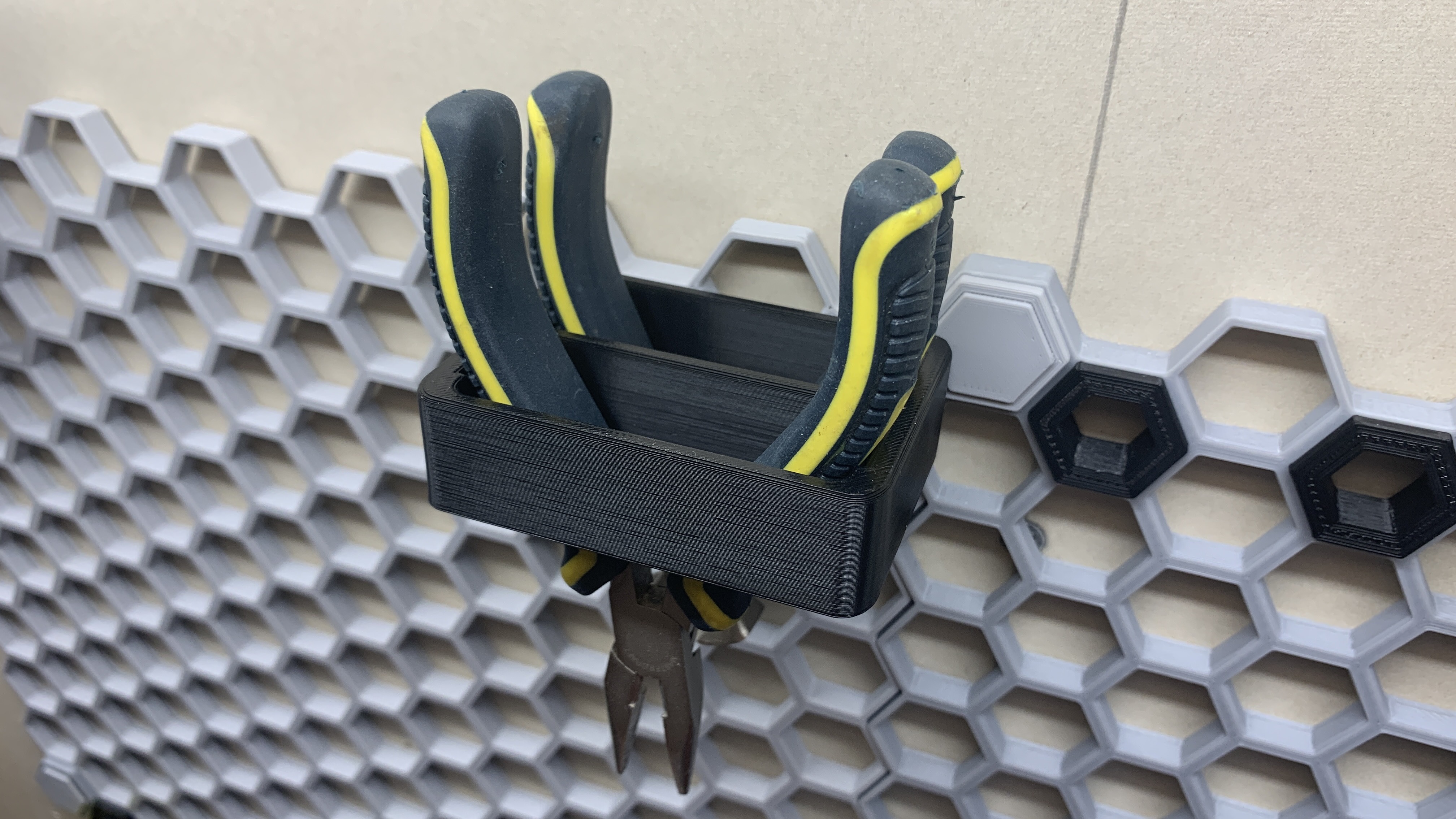 Honeycomb wall pliers holder (60mm x 20mm) 3D model thumbnail