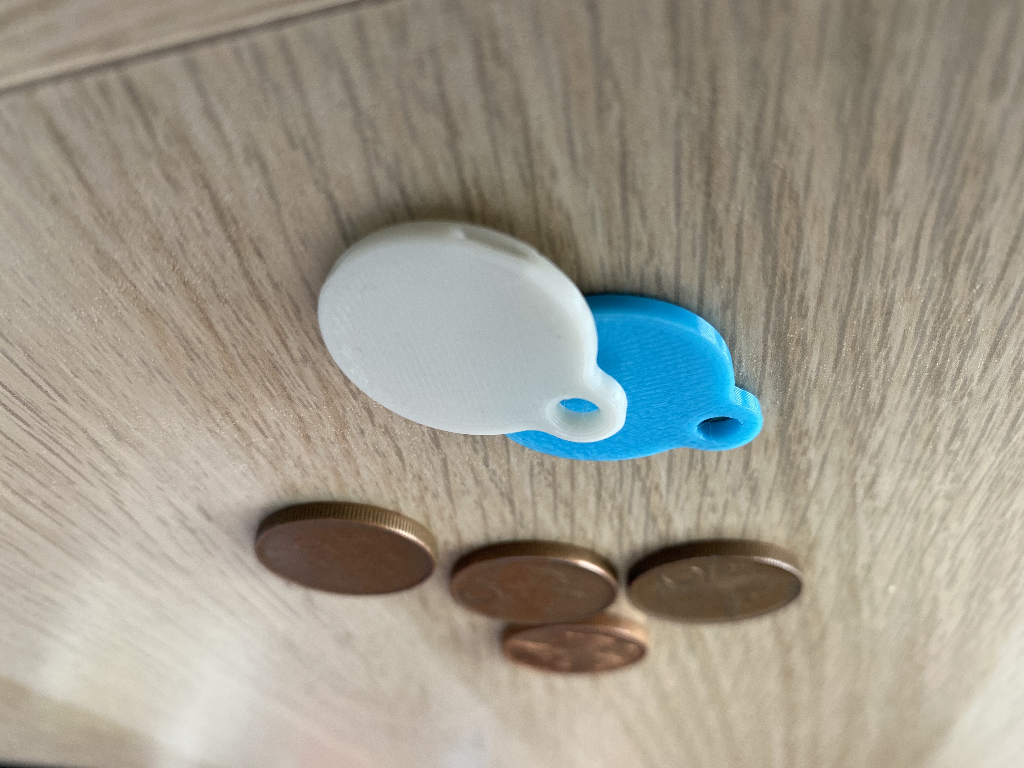Flat coin whistle / shopping cart token