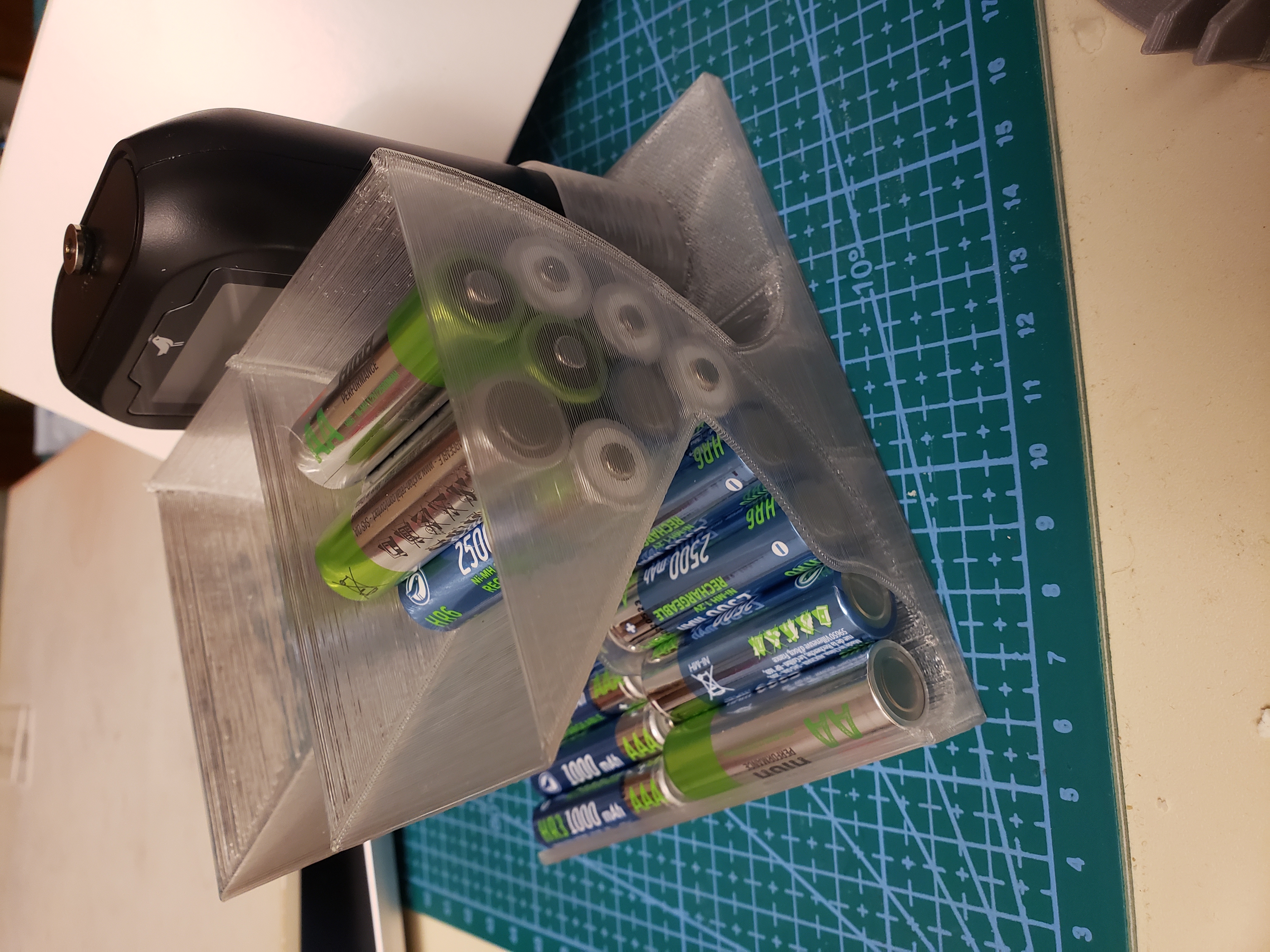 Easy to print AA and AAA battery dispenser with backpocket