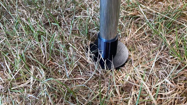 A simple foot for the kitchen legs of a Camp-Let tent trailer