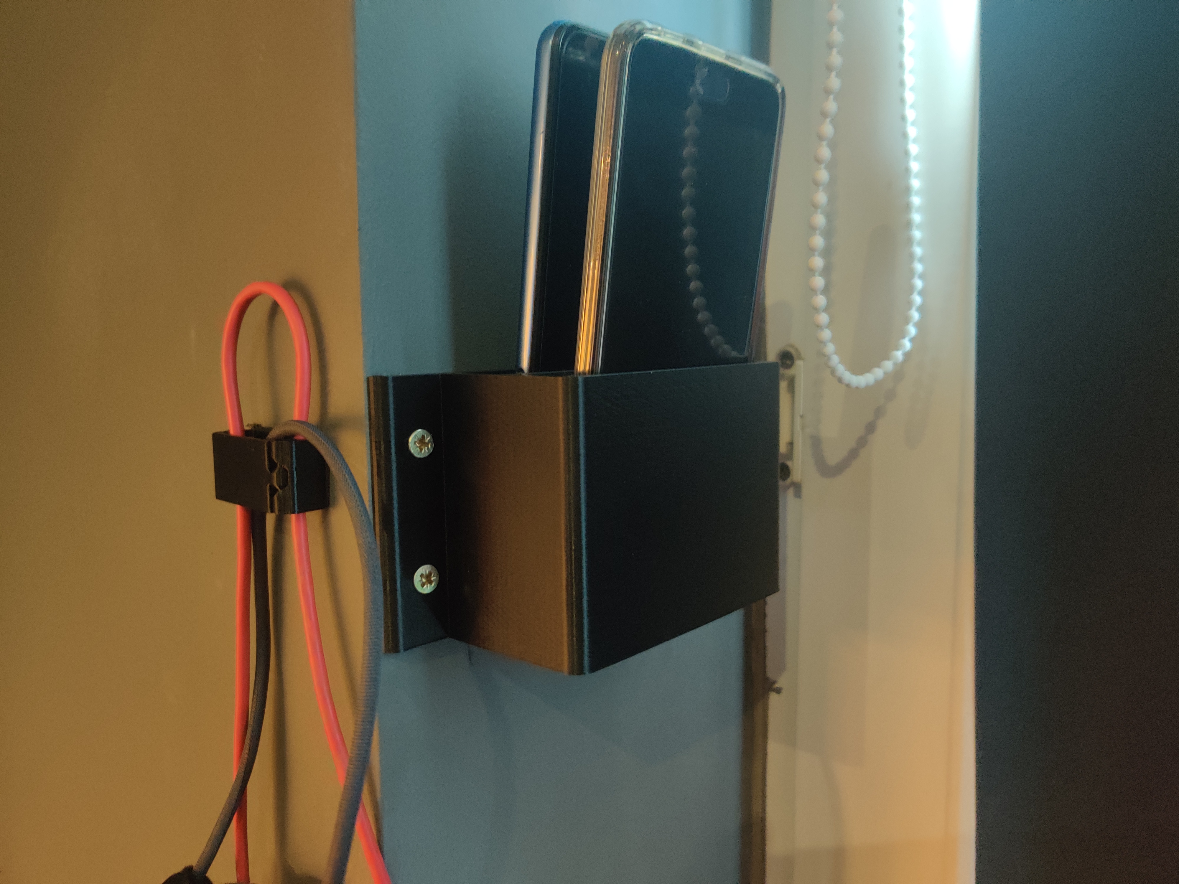 Double Phone Pocket - wall mounted storage for multiple phones