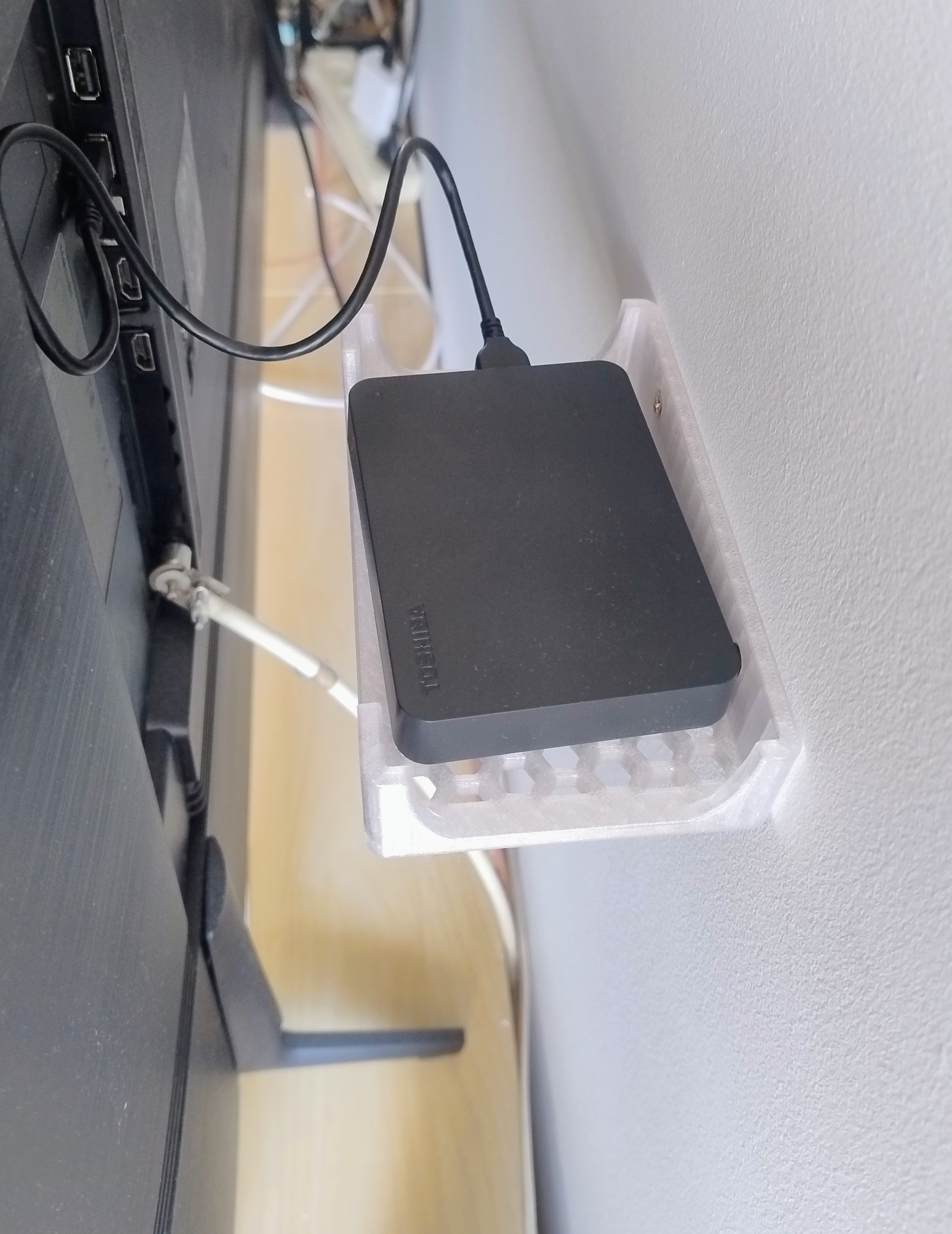 Wall mount for disk. Uchwyt ścienny na dysk.