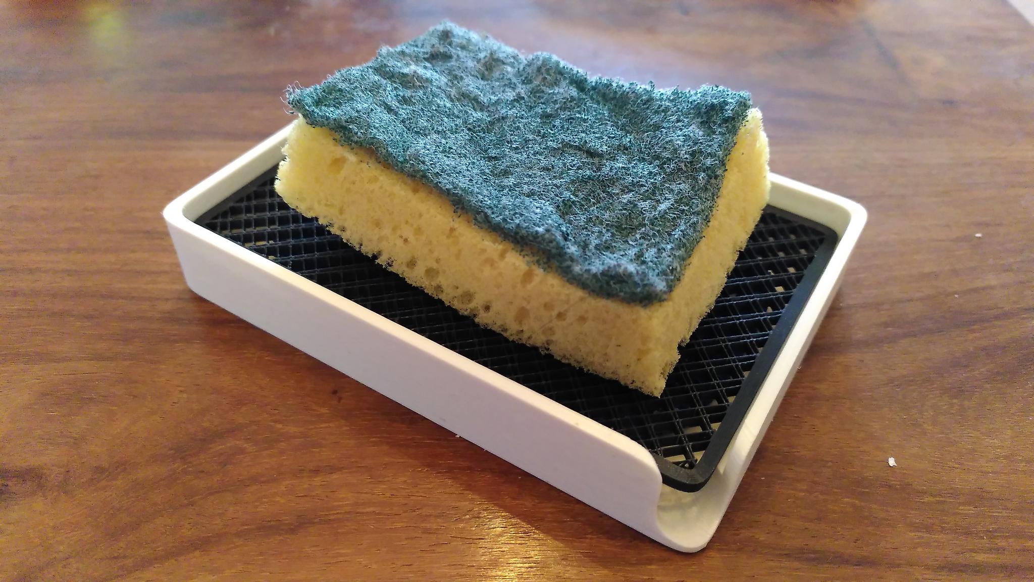 Sponge or soap holder with soap savior drawer