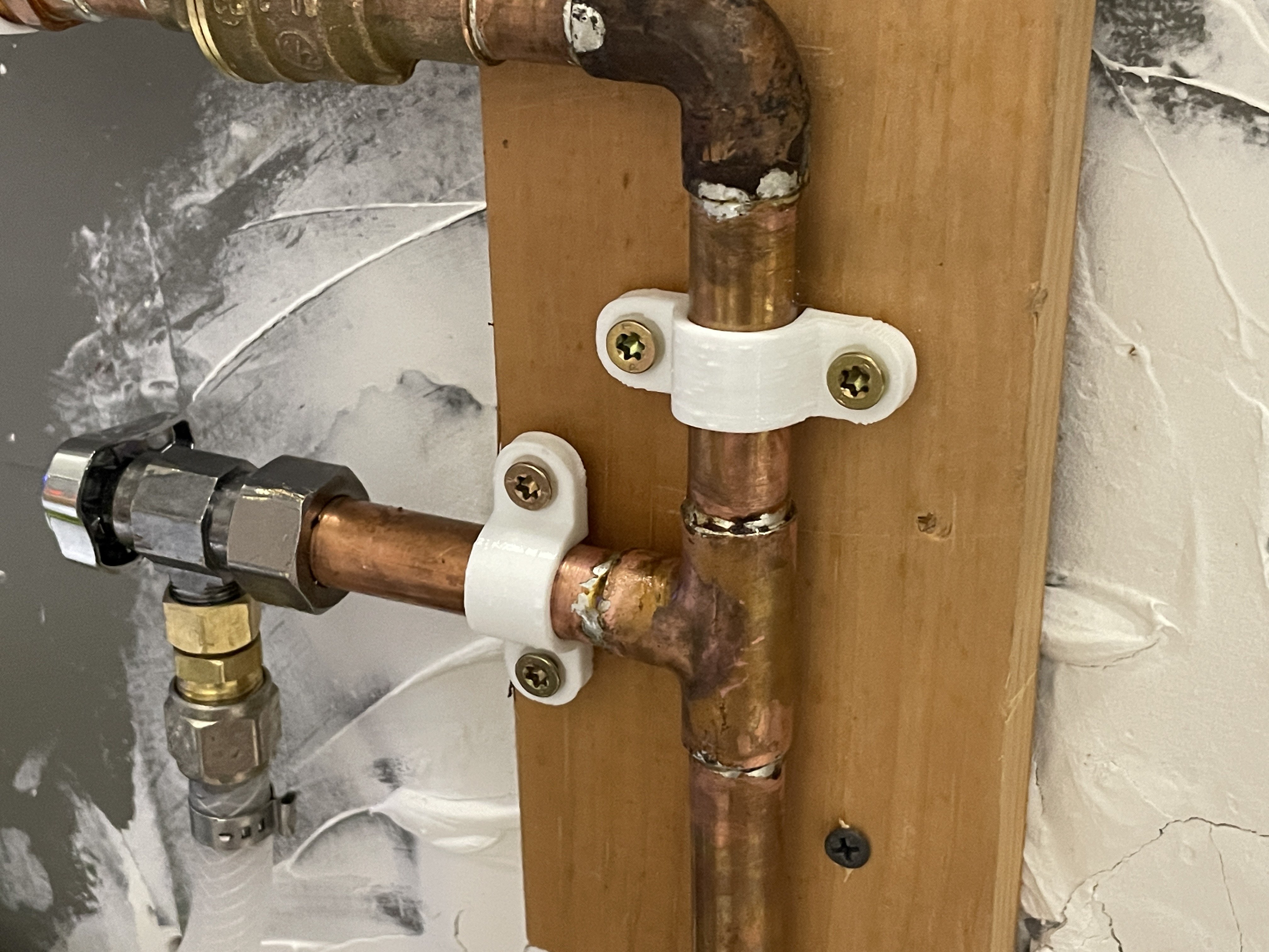 Water Line 1/2" Half Inch Copper Pipe Strap Bracket Mount Fastener (many possible names) That comes in 2 tightnesses!
