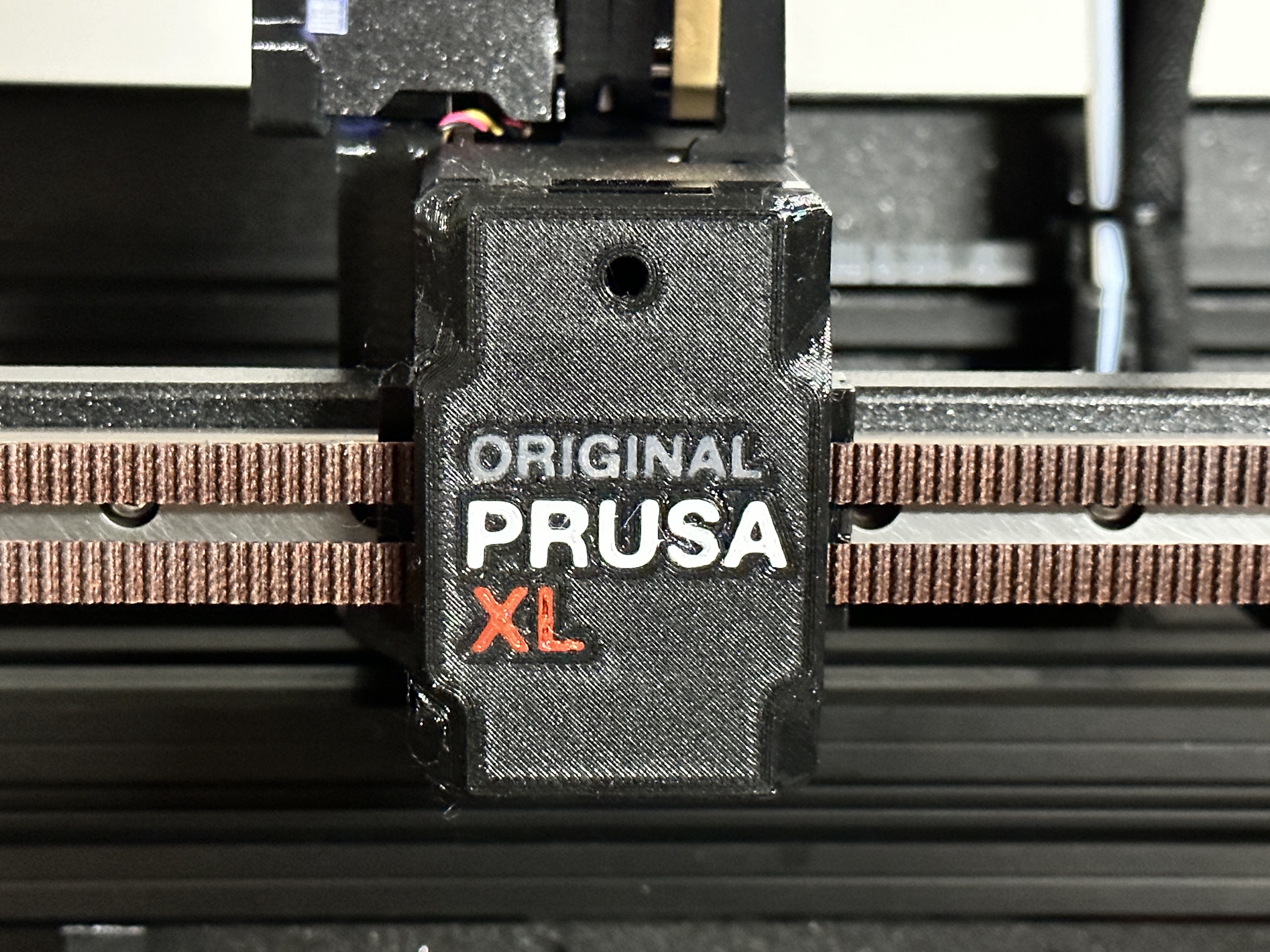 Prusa XL X-Carriage cover with access to Nextruder nozzle grub screw