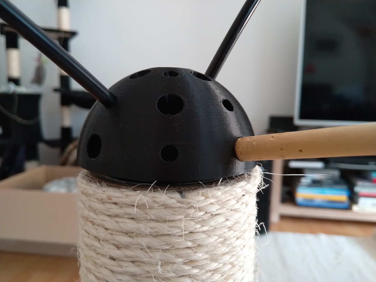 Cat scratch post top toy holder