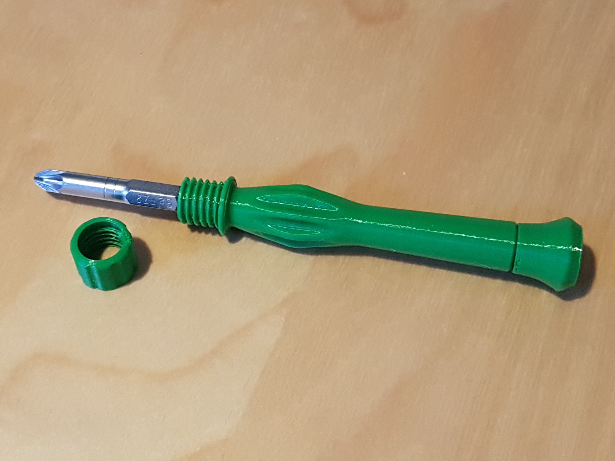 Improved lock nut for ergonomic screw driver
