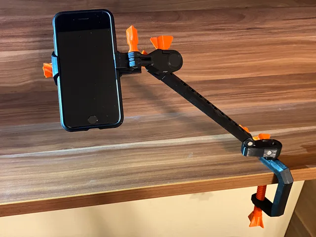 Variable mobile phone holder with clamp