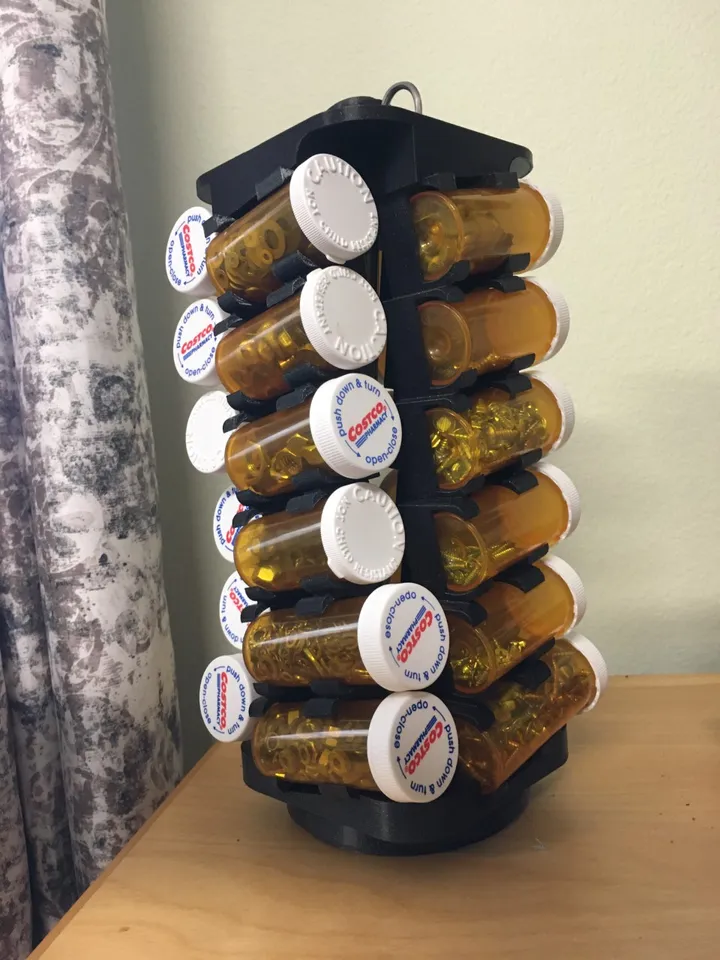 Rotating Pill Bottle Storage Tower. by hbert