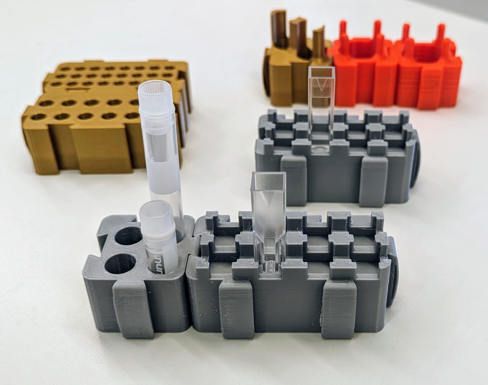 Moldular tube holders