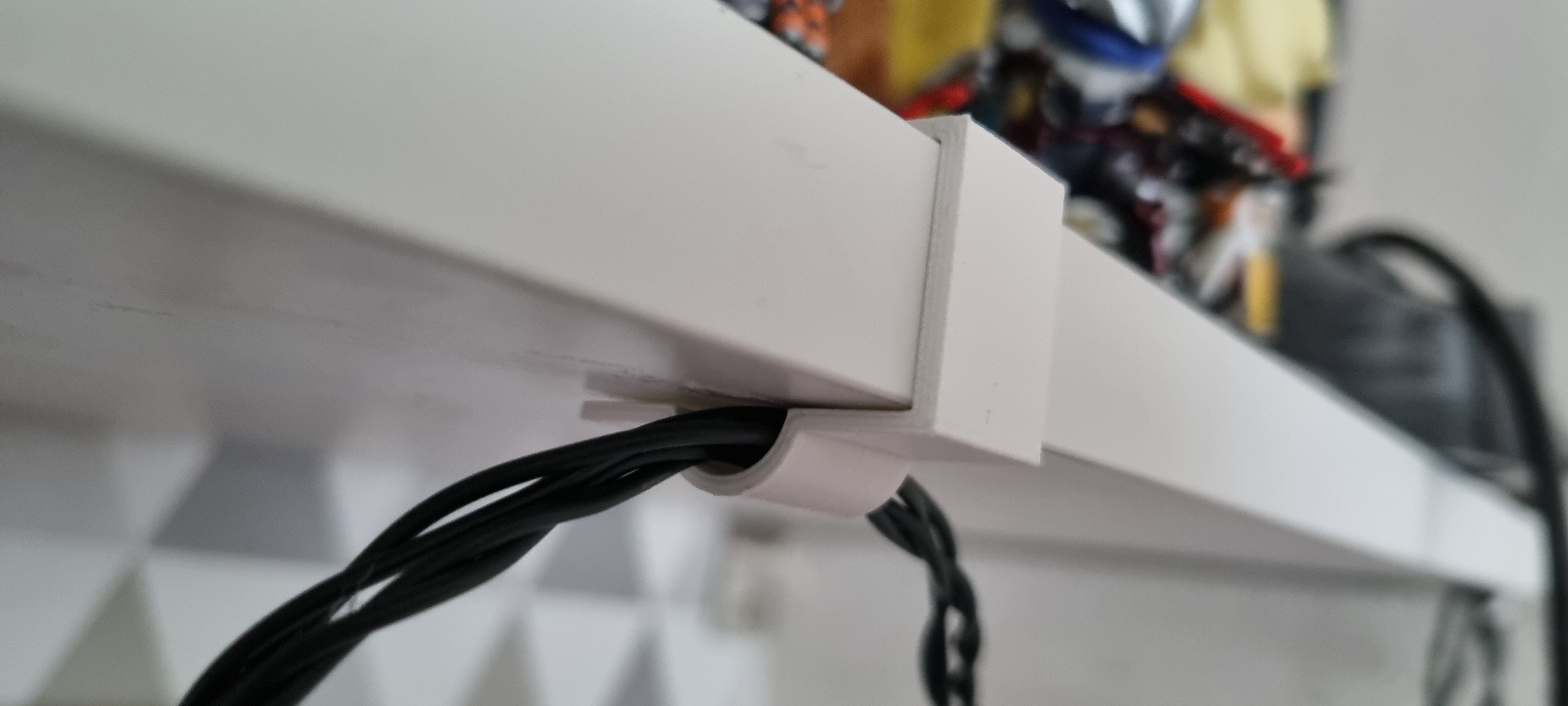 Cable clip for shelf/desk