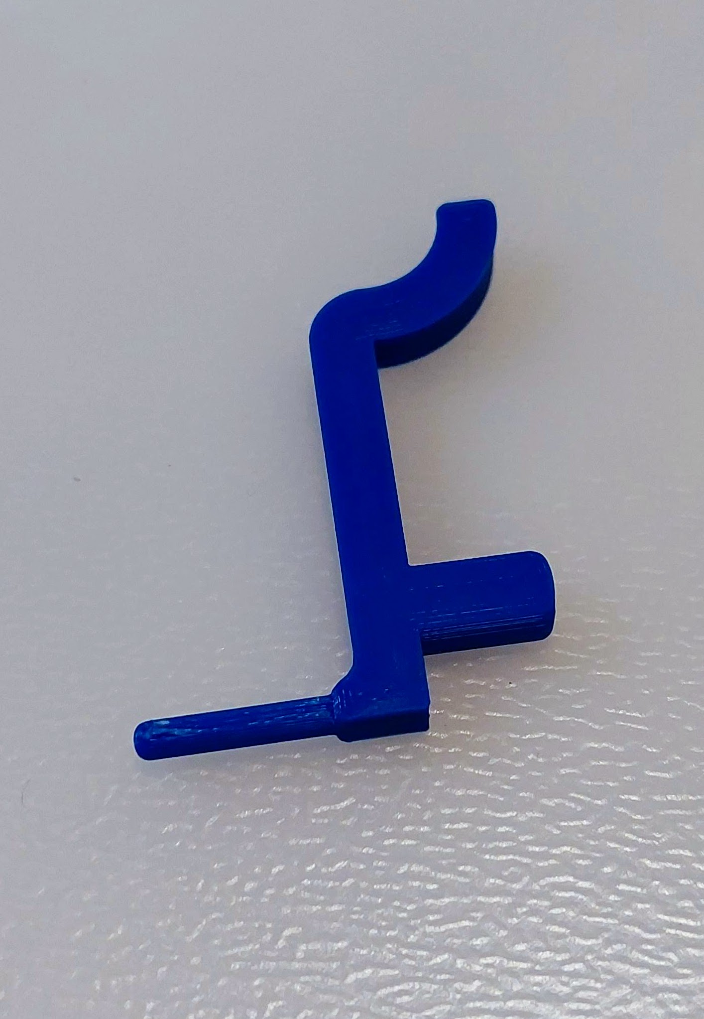 Tiny Peg for a Pegboard Hook