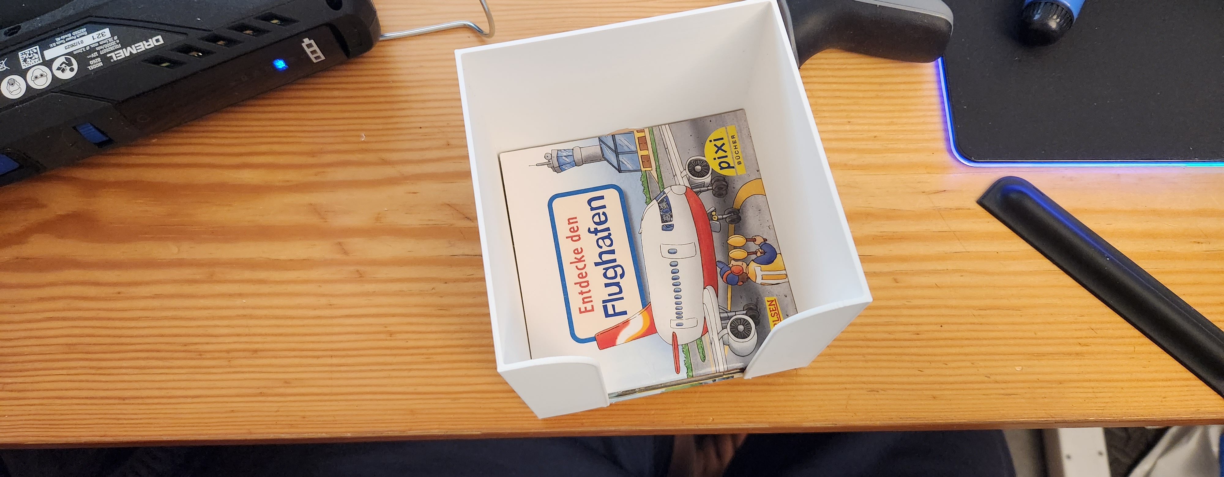 Pixiebuchhalterungsvorrichtung — miniatura 3