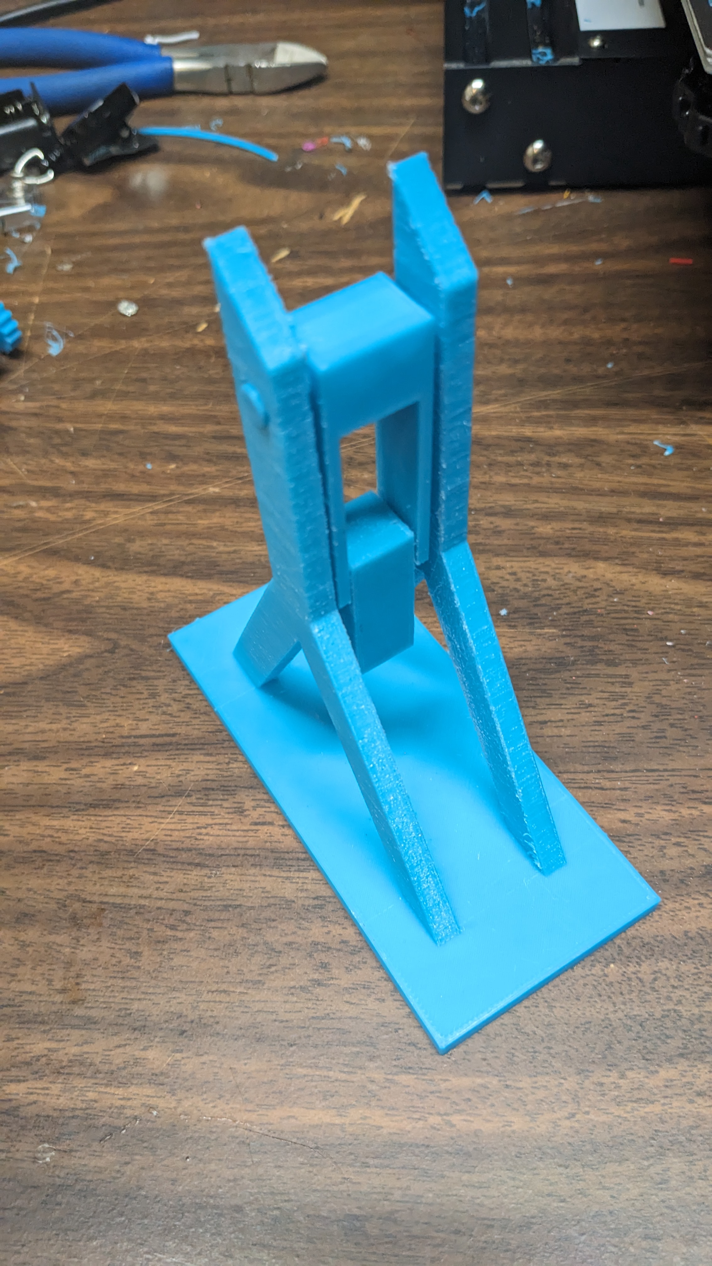 Double pendulum desk toy