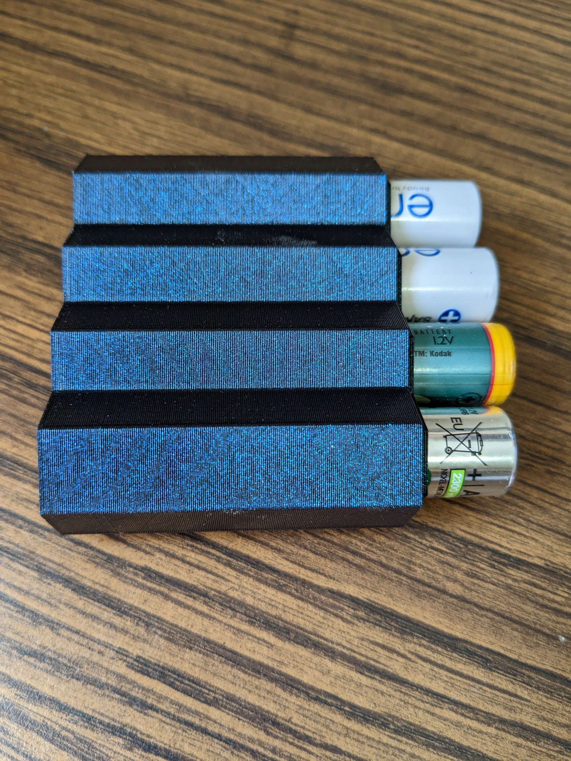 Miniatura 5 do modelo 3D Stackable AA Battery Holder