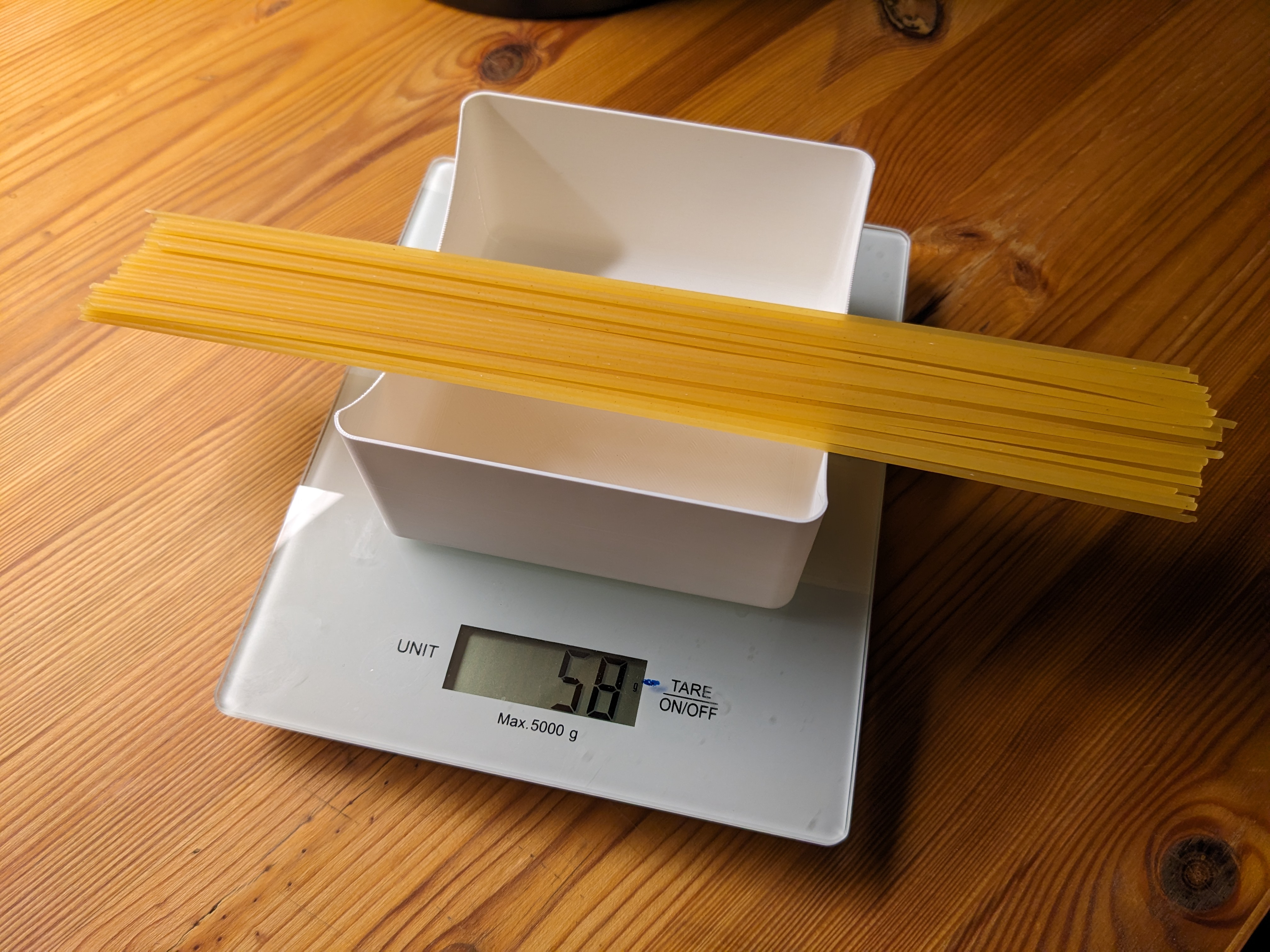 Container for measuring spaghetti & macaroni