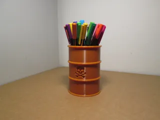 Pencil stand in the shape of a barrel