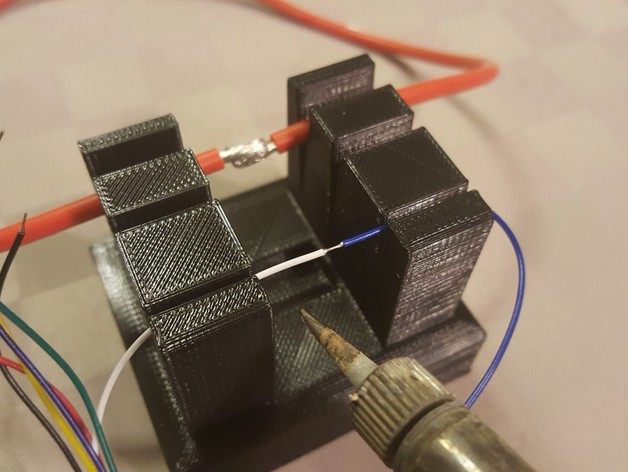 Apollador de cables para soldar