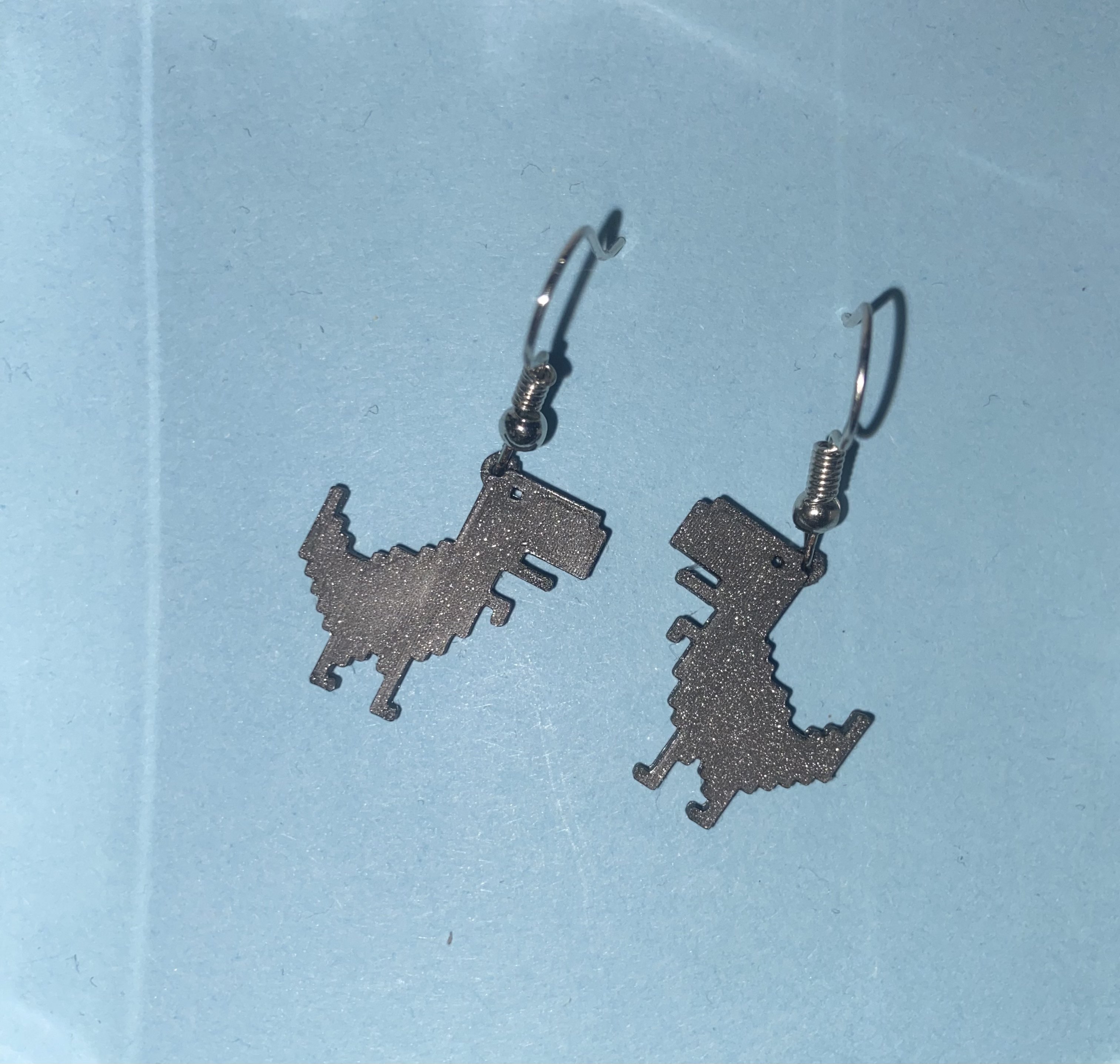 Offline dinosaur earrings smaller by wolfgang weber download free stl
