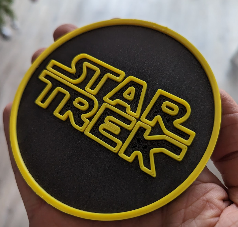 STAR TREK coaster parody in Star Wars font