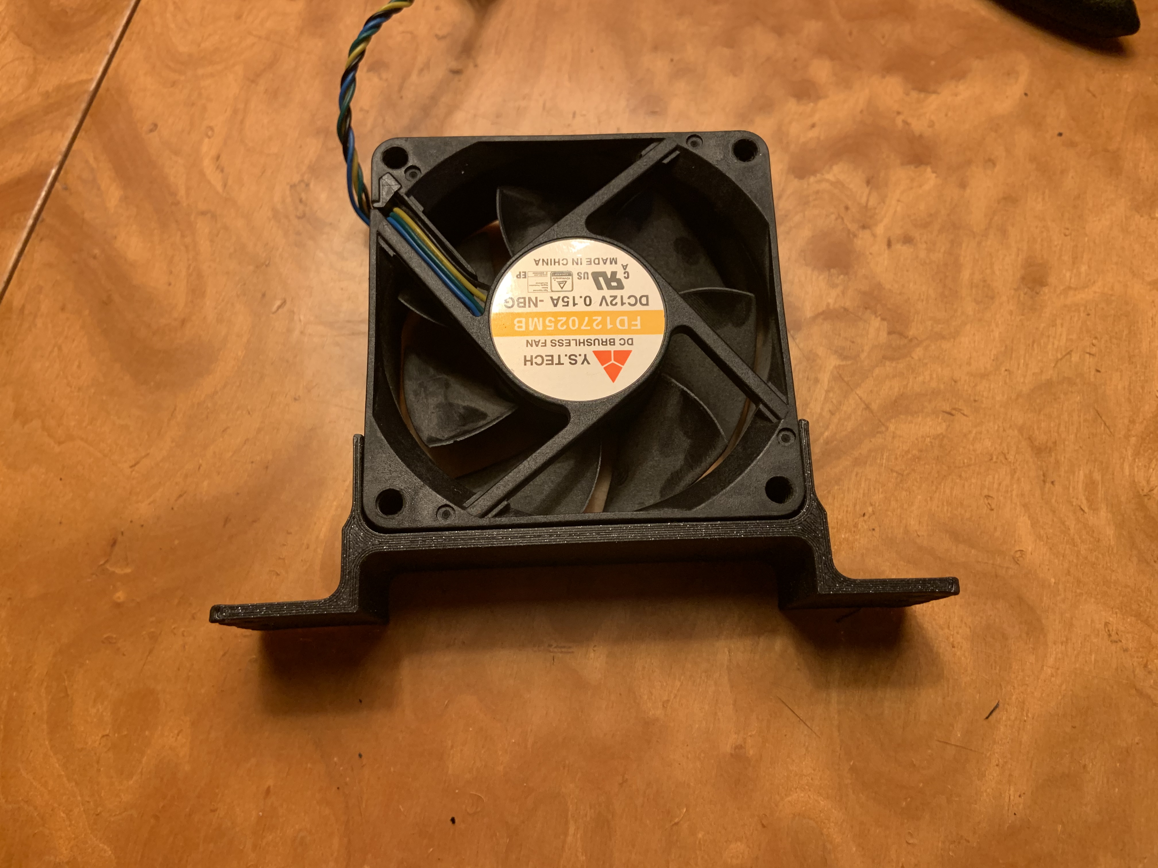 70mm Fan mount between HDD cages