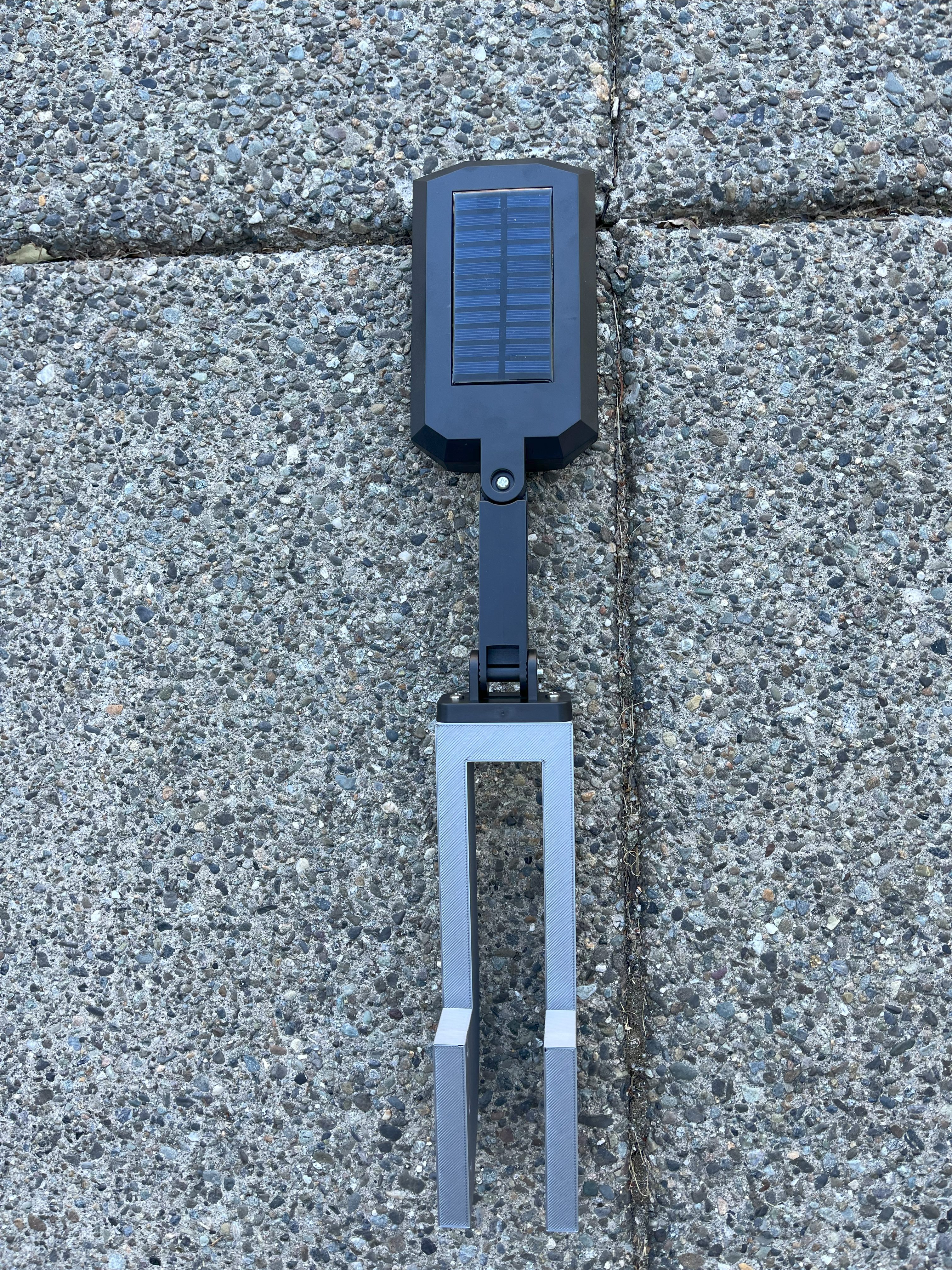 Solar motion detecting light to rafter mount