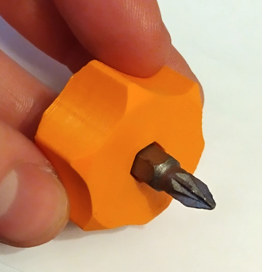 Compact screwdriver bit holder