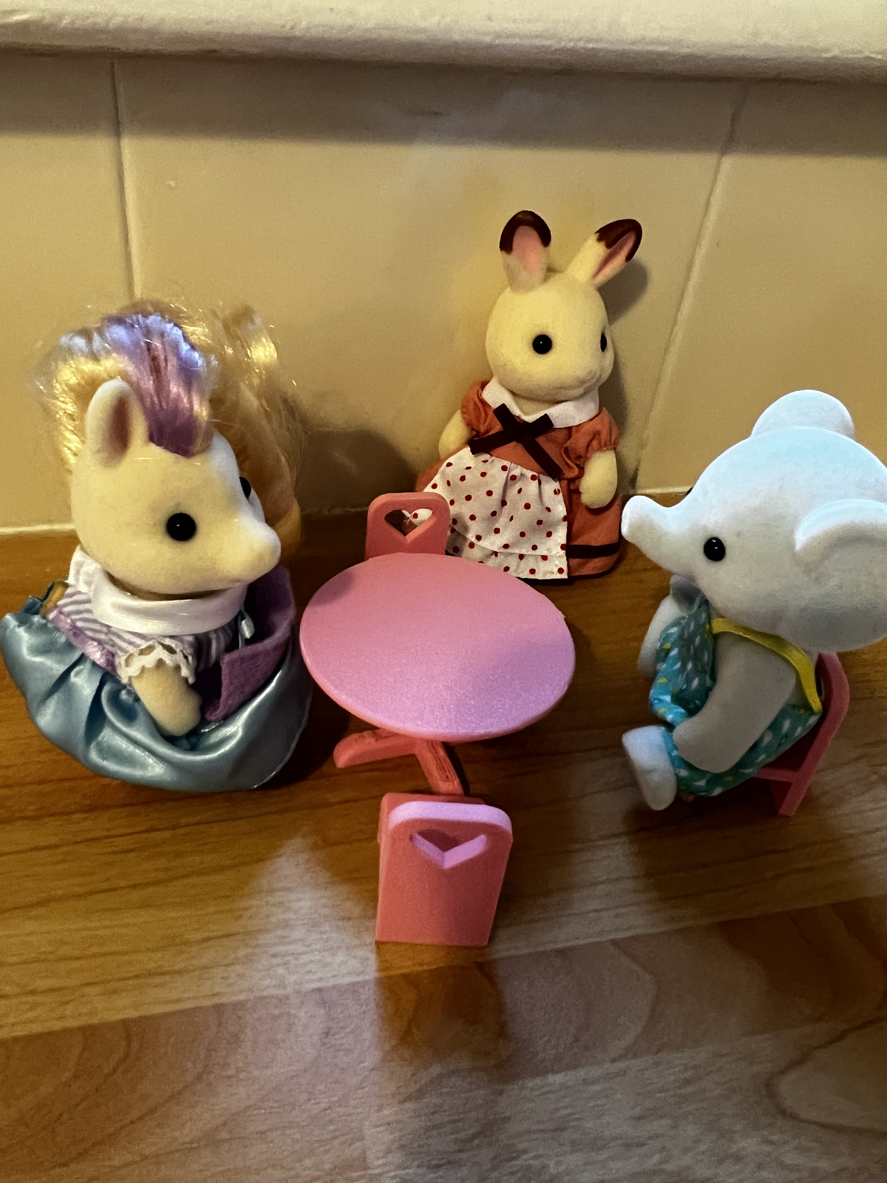 Dolls house table and chairs
