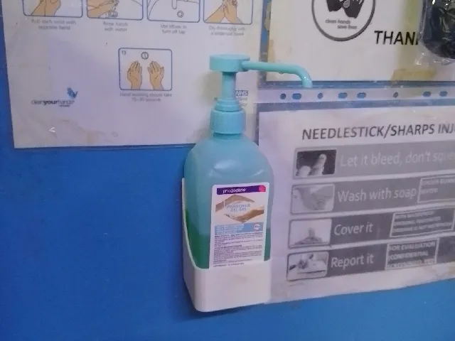 Hand sanitizer/soap holder