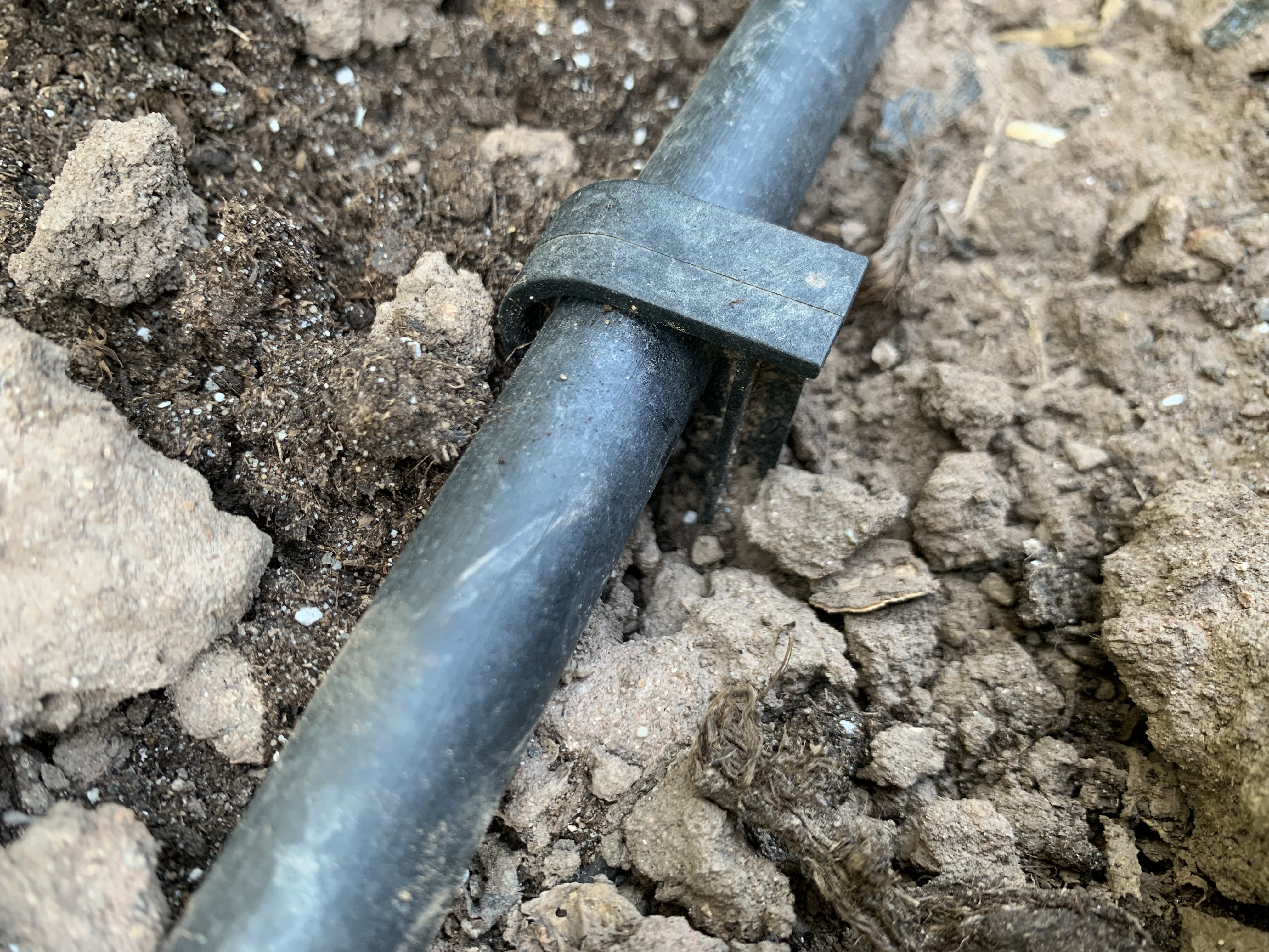 Distribution tubing holder for micro drip irrigation