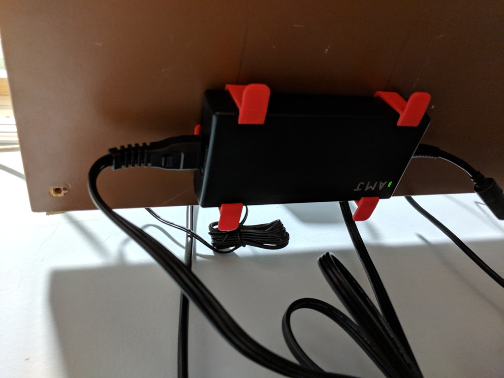 Mounting bracket for Dell laptop power brick by Aaron Johnson