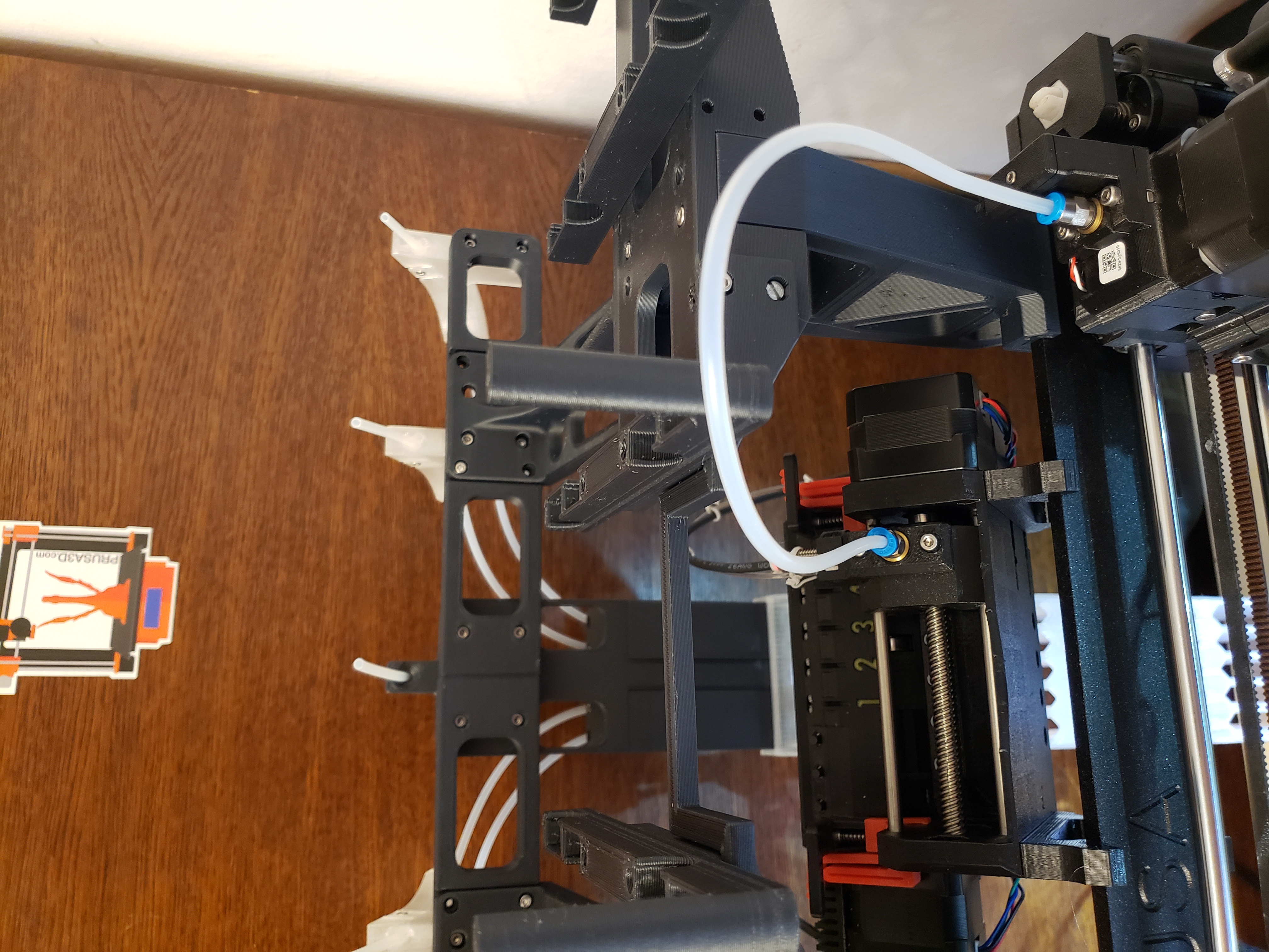 Tall print cross bar and roller carriers for MMU Tower Print Buffer