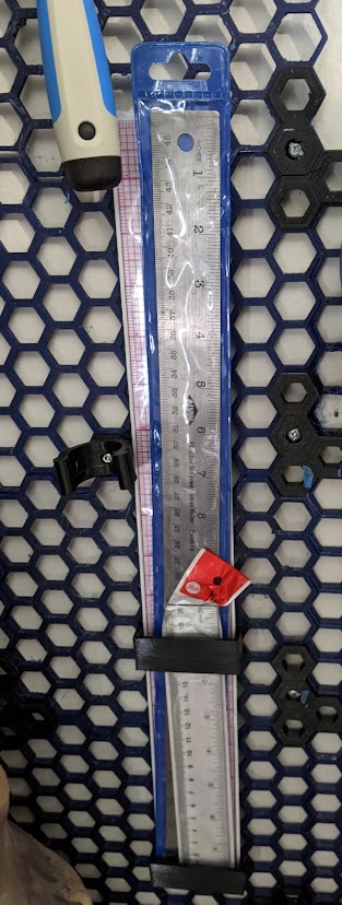 Paramaterized Honeycomb Storage Wall Ruler (or other long rectangular object) holder