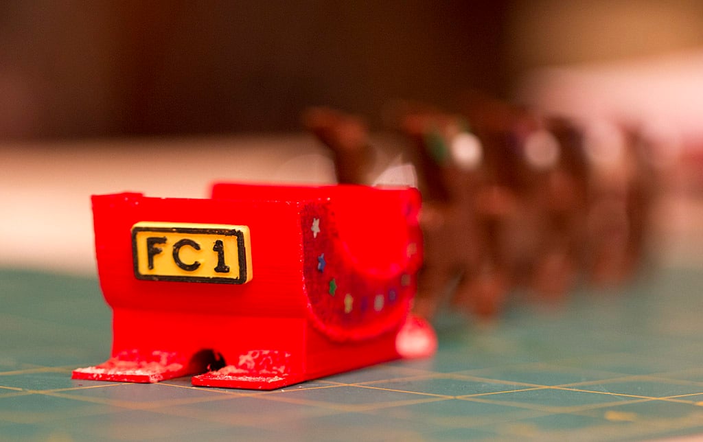 Sleigh with number plate and decorated reindeers