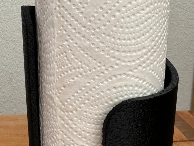 Paper towel holder/dispenser
