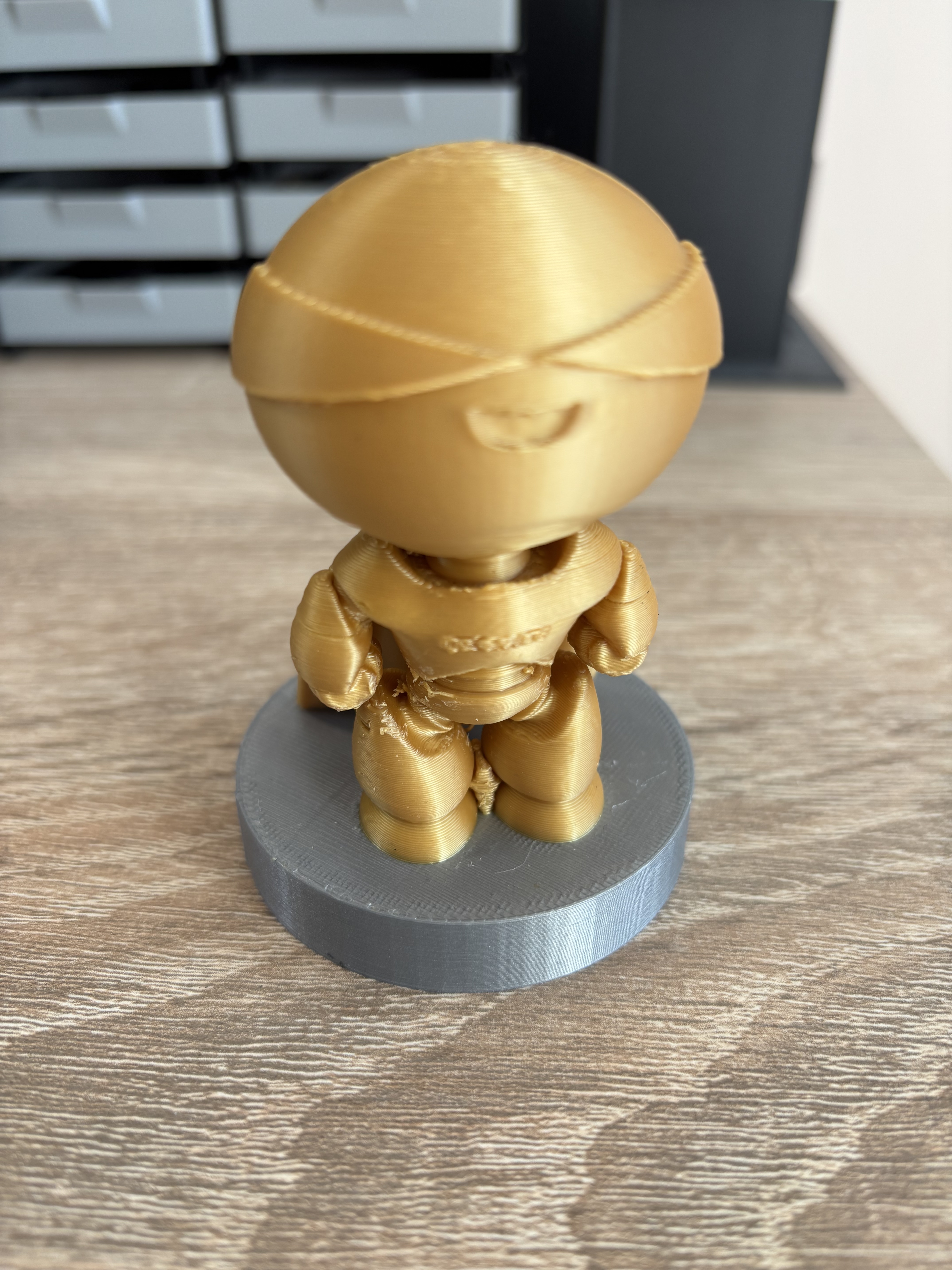 Golden Creality mascot